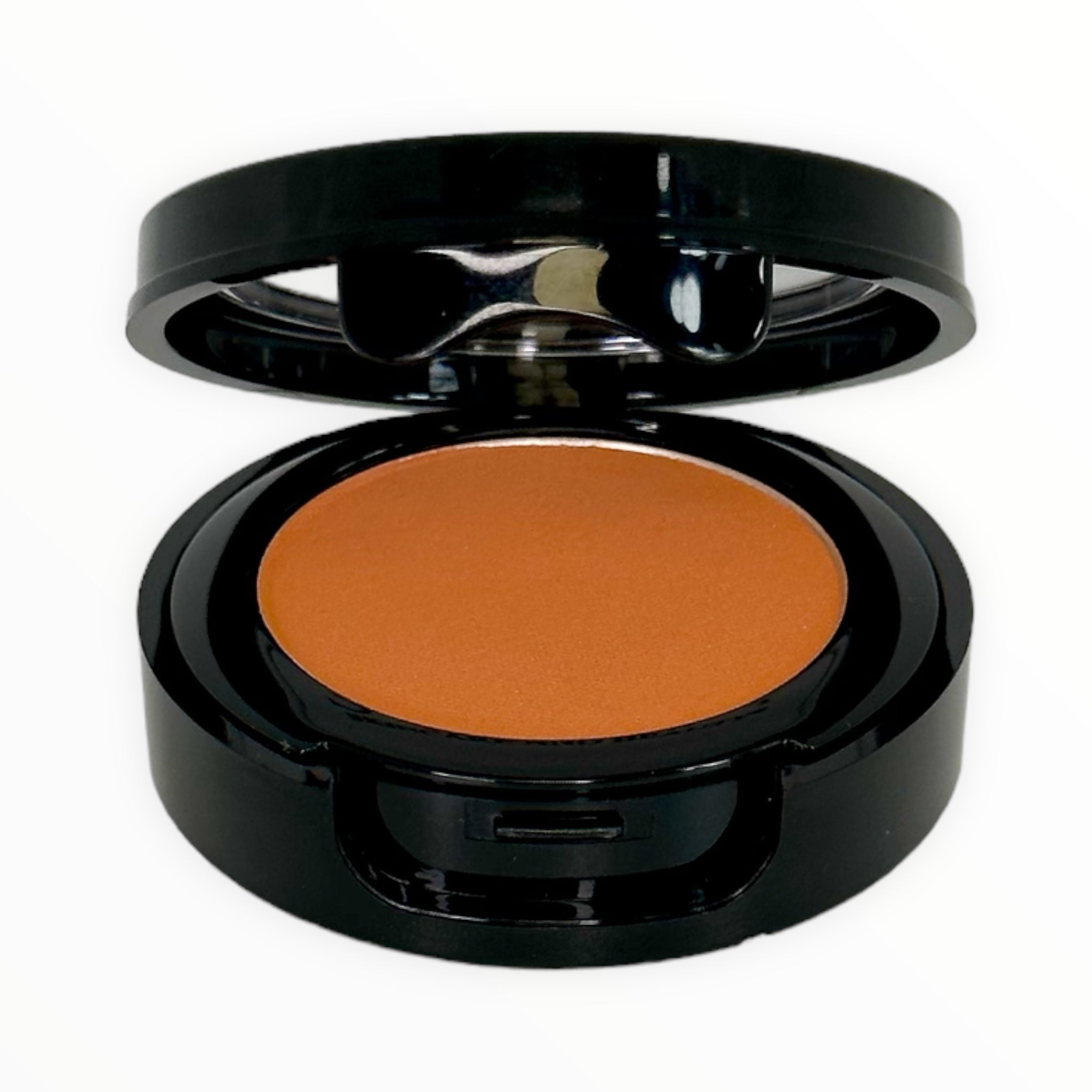 Pumpkin-Warm Orange matte powder blush in a compact, showcasing its vibrant color and smooth texture.