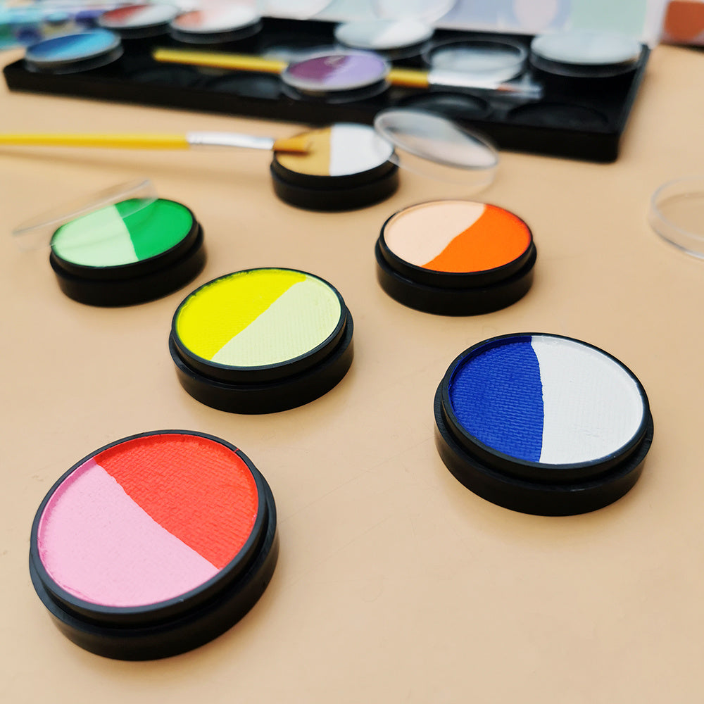 A vibrant set of Rainbow Face Paint featuring 12 colorful groups in a compact box, ideal for body art and temporary tattoos.