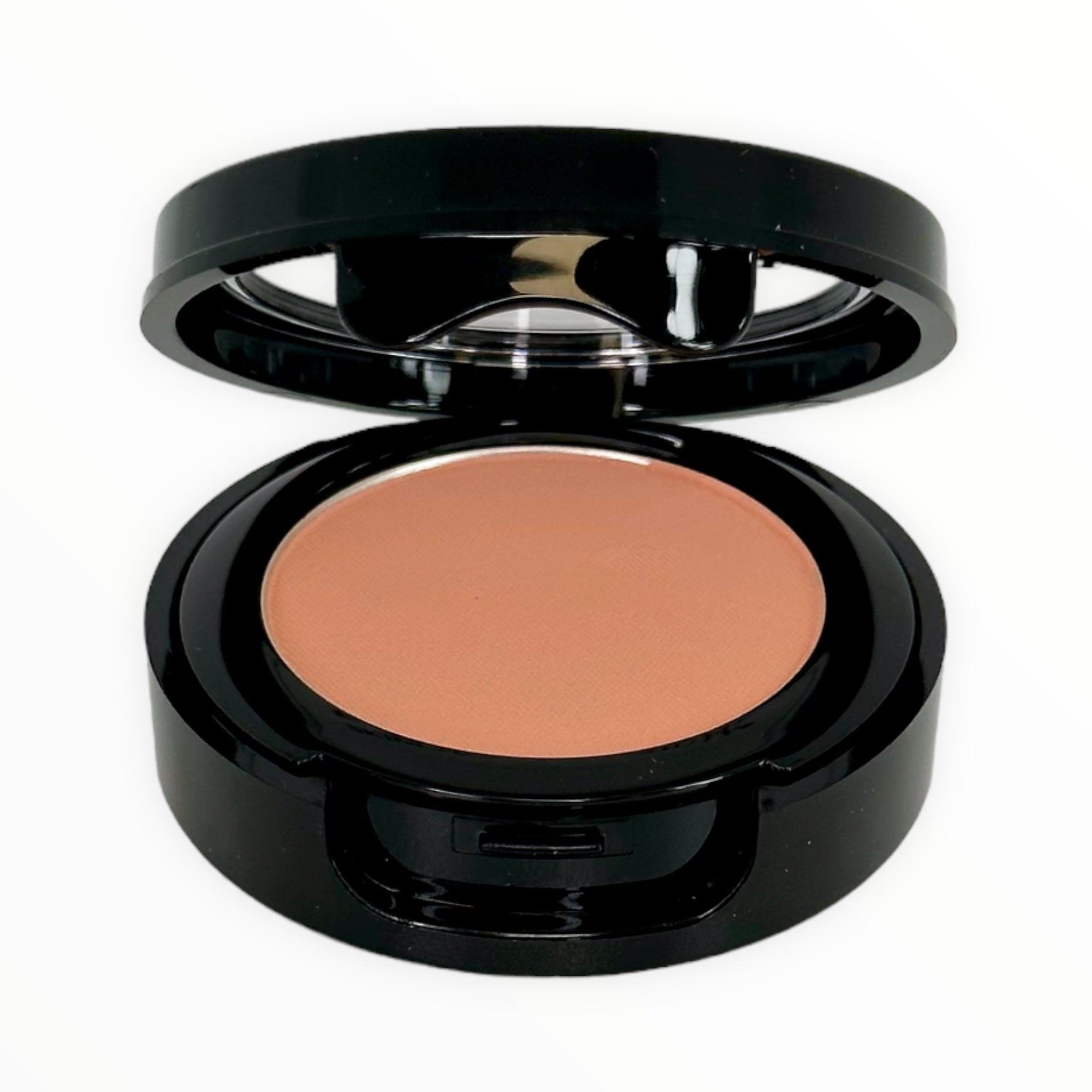 TAWNY PEACH-SOFT PEACH matte powder blush in a compact, showcasing its smooth texture and rich color.