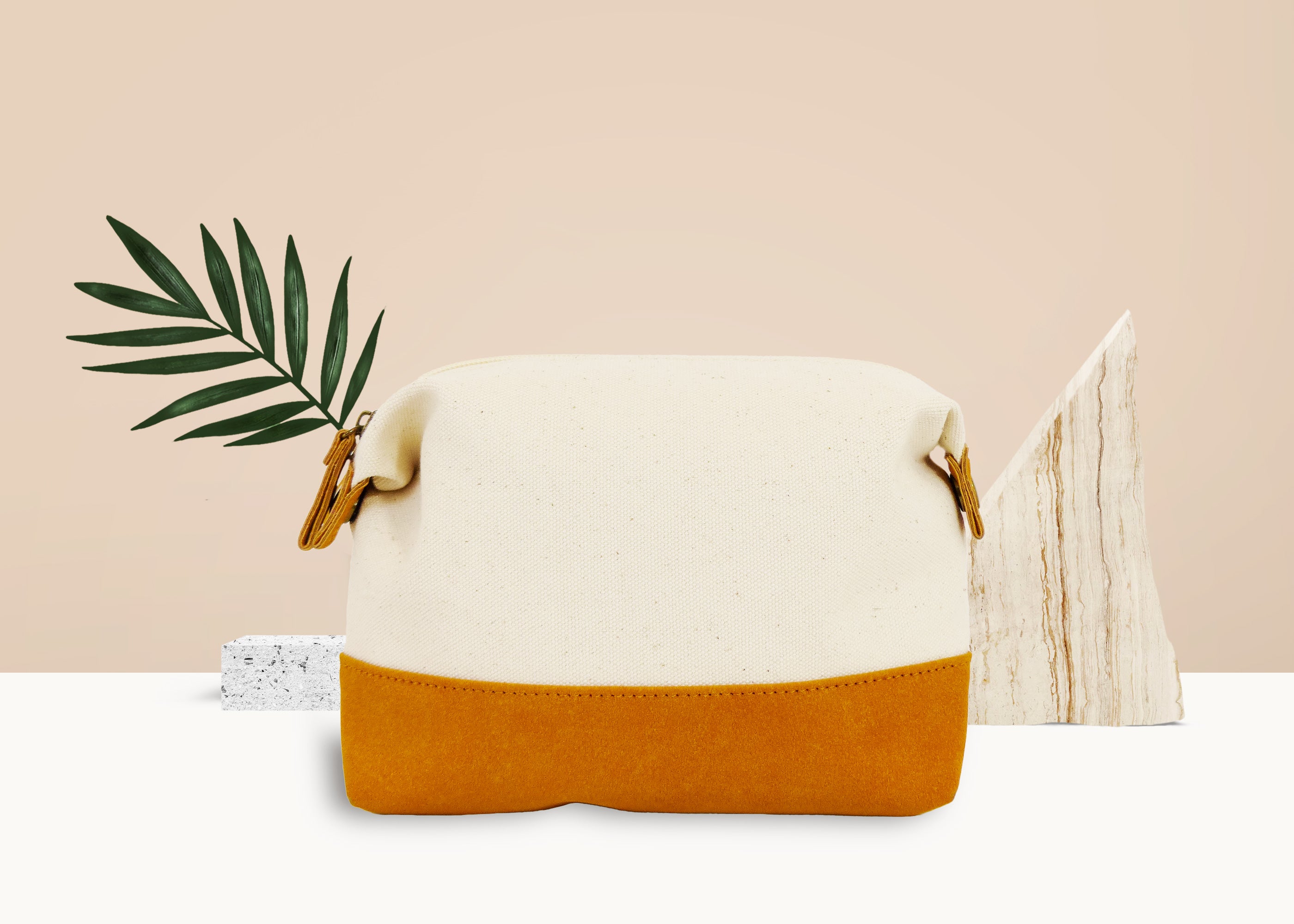 Travel Buddy Toiletry Bag in Bliss Curry/Cream, featuring a stylish design with snap-down sides and a secure zipper compartment.