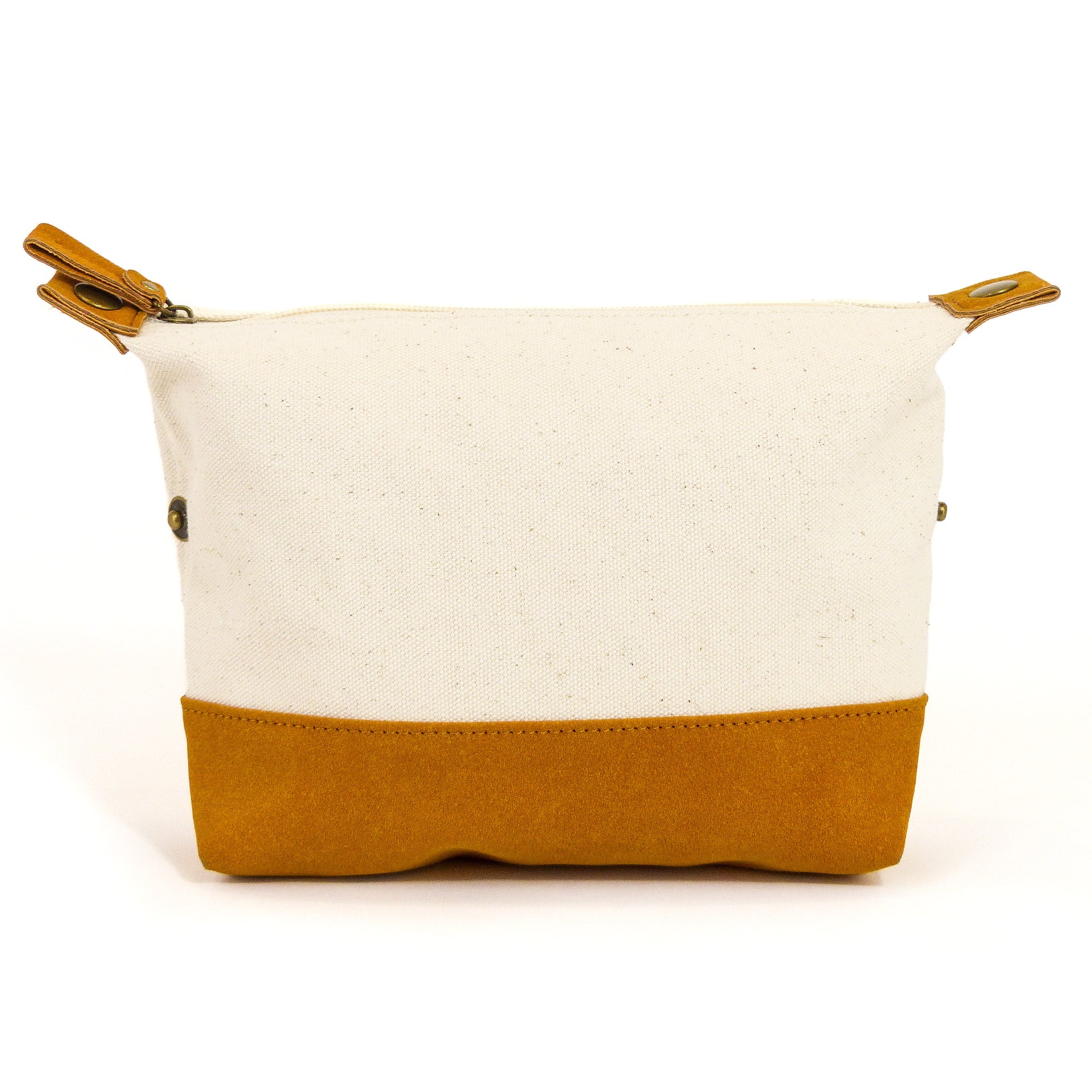 Travel Buddy Toiletry Bag in Bliss Curry/Cream, featuring a stylish design with snap-down sides and a secure zipper compartment.