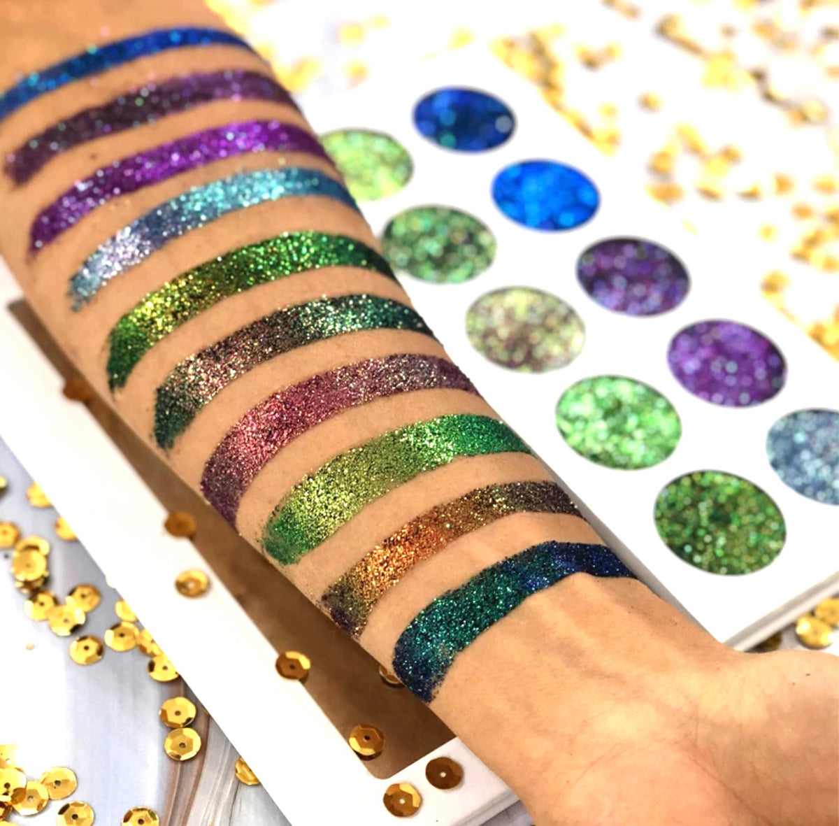 Wizarding World Chameleon Multichrome Glitter Eyeshadow Palette showcasing vibrant pinks, violets, golds, and greens in a sleek design.