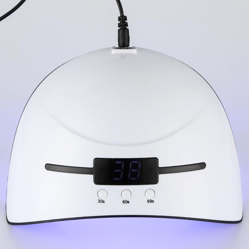 Acrylic Gel UV LED Nail Curing Lamp with USB cable, showcasing its sleek design and compact size.