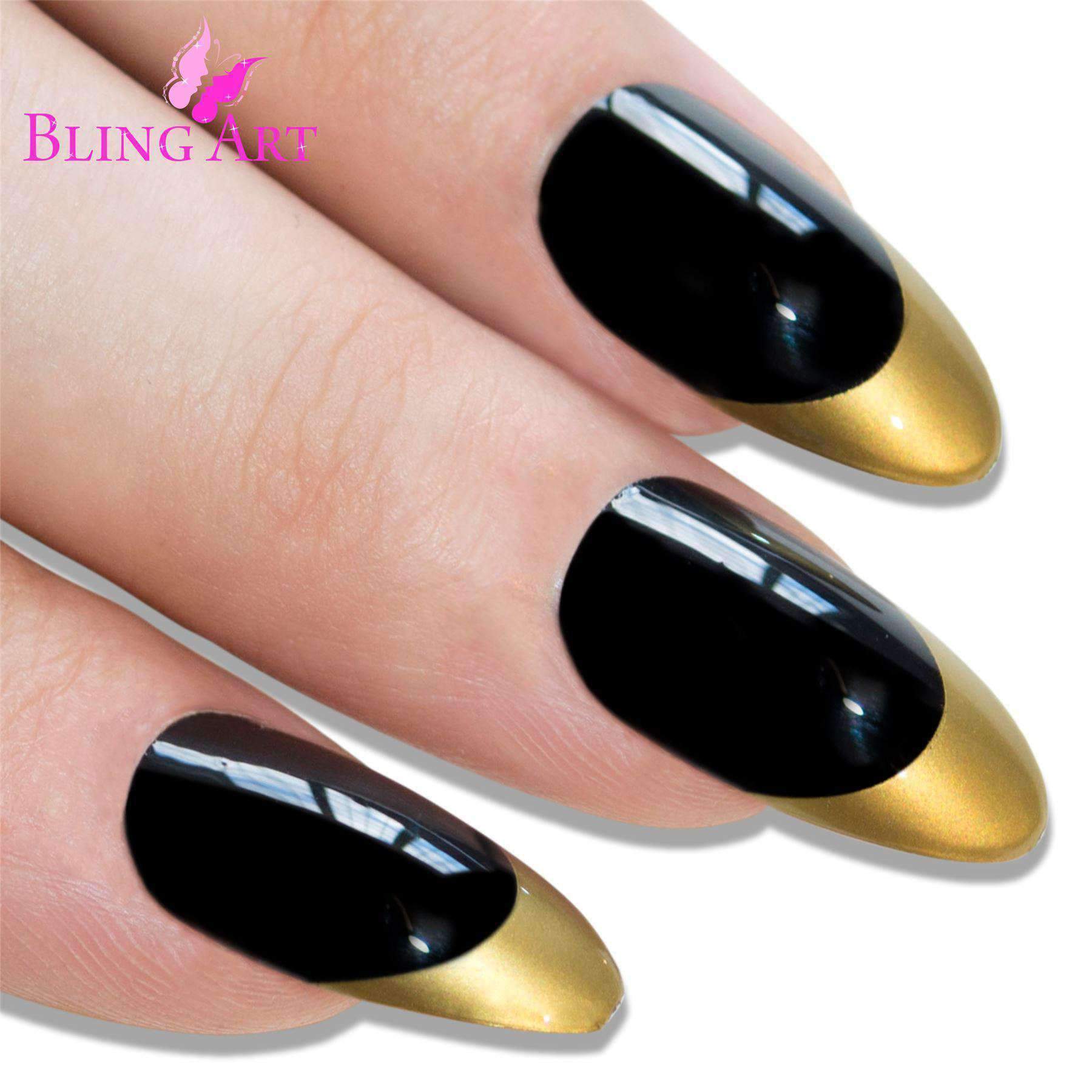 A set of Bling Art Black Gold Almond Stiletto Long Fake Acrylic Nails featuring a glossy black base with luxurious gold tips, accompanied by glue, a nail file, and a cuticle stick.