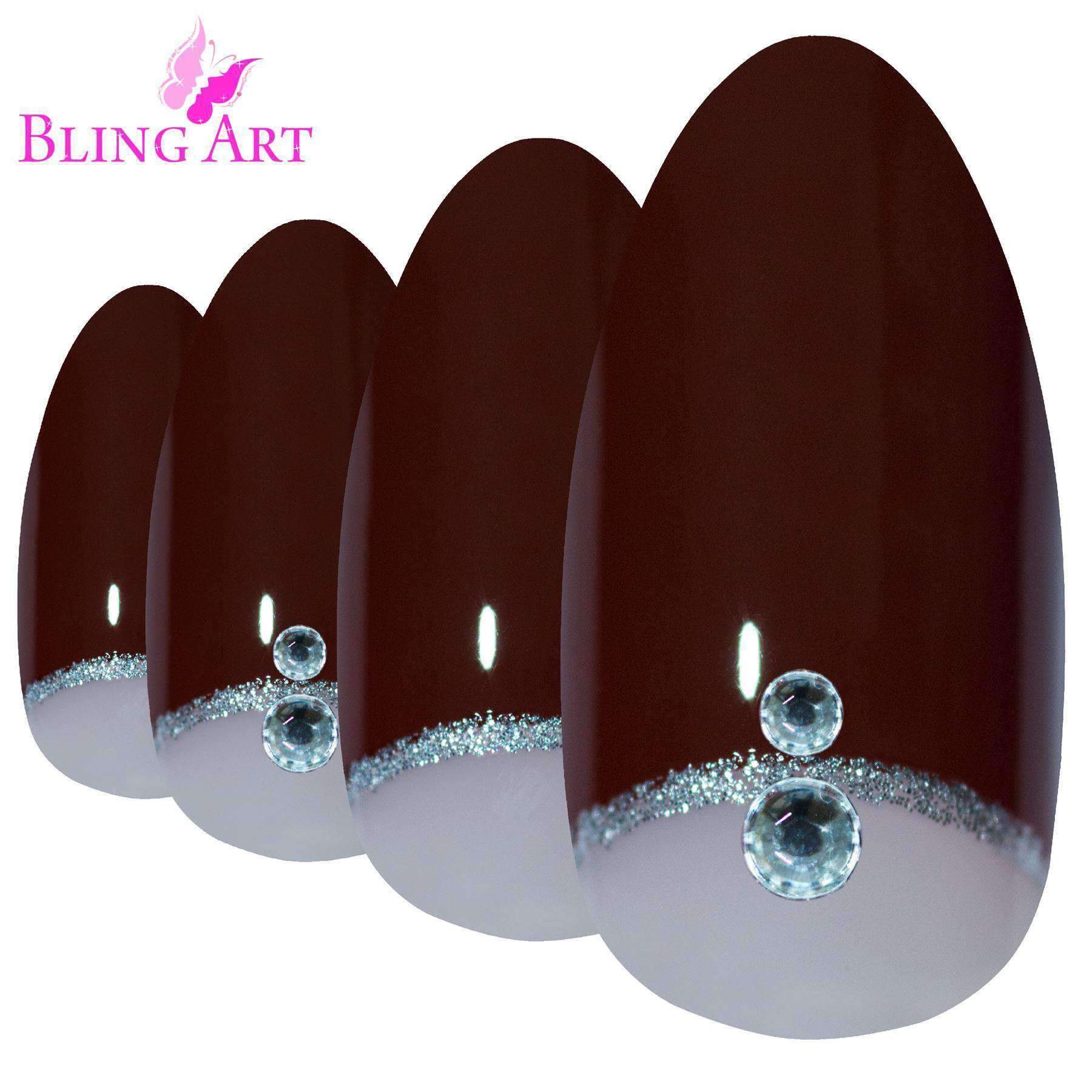 A set of Bling Art Red Brown Almond Stiletto Long Fake Acrylic Tips featuring elegant crystal details, including 24 nails in various sizes, glue, nail file, and cuticle stick.