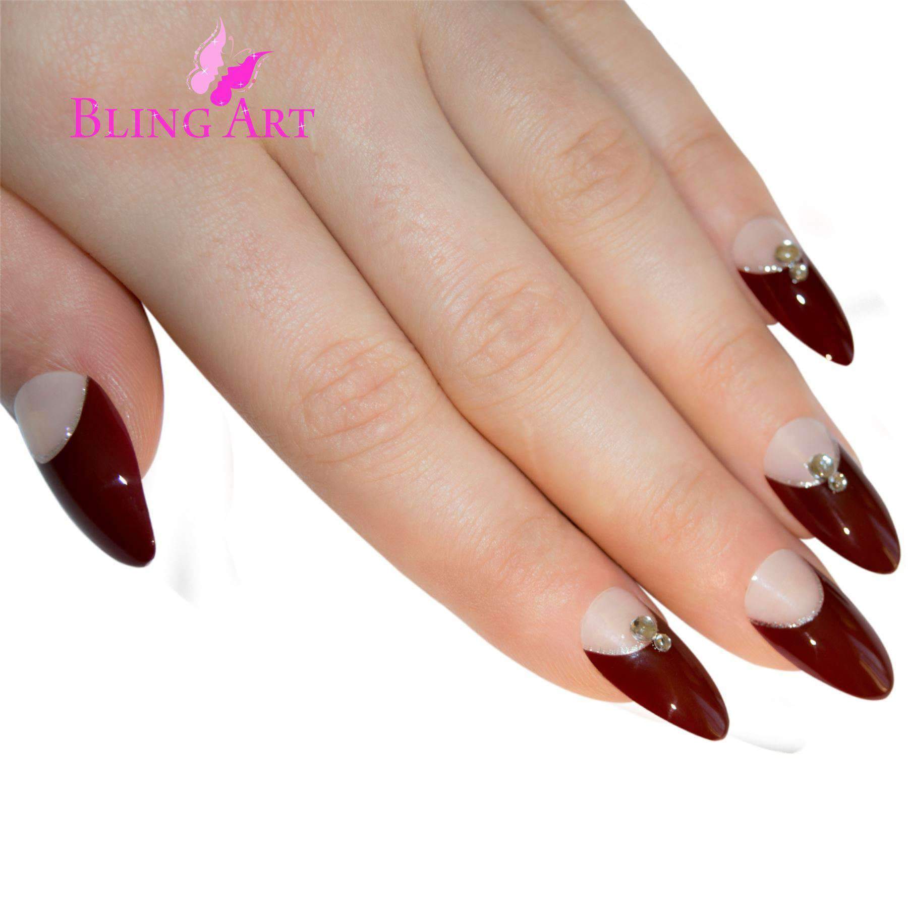 A set of Bling Art Red Brown Almond Stiletto Long Fake Acrylic Tips featuring elegant crystal details, including 24 nails in various sizes, glue, nail file, and cuticle stick.