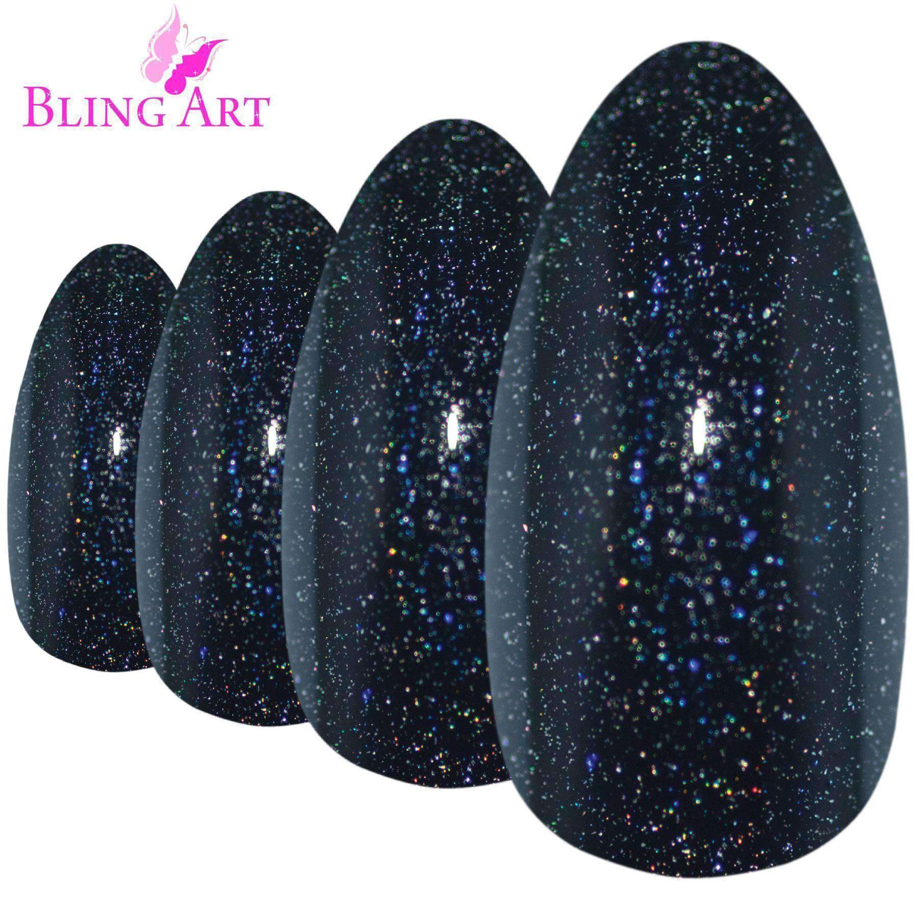 Bling Art Black Gel Almond Stiletto false nails displayed with glue, nail file, and cuticle stick, showcasing their glossy finish and elegant shape.