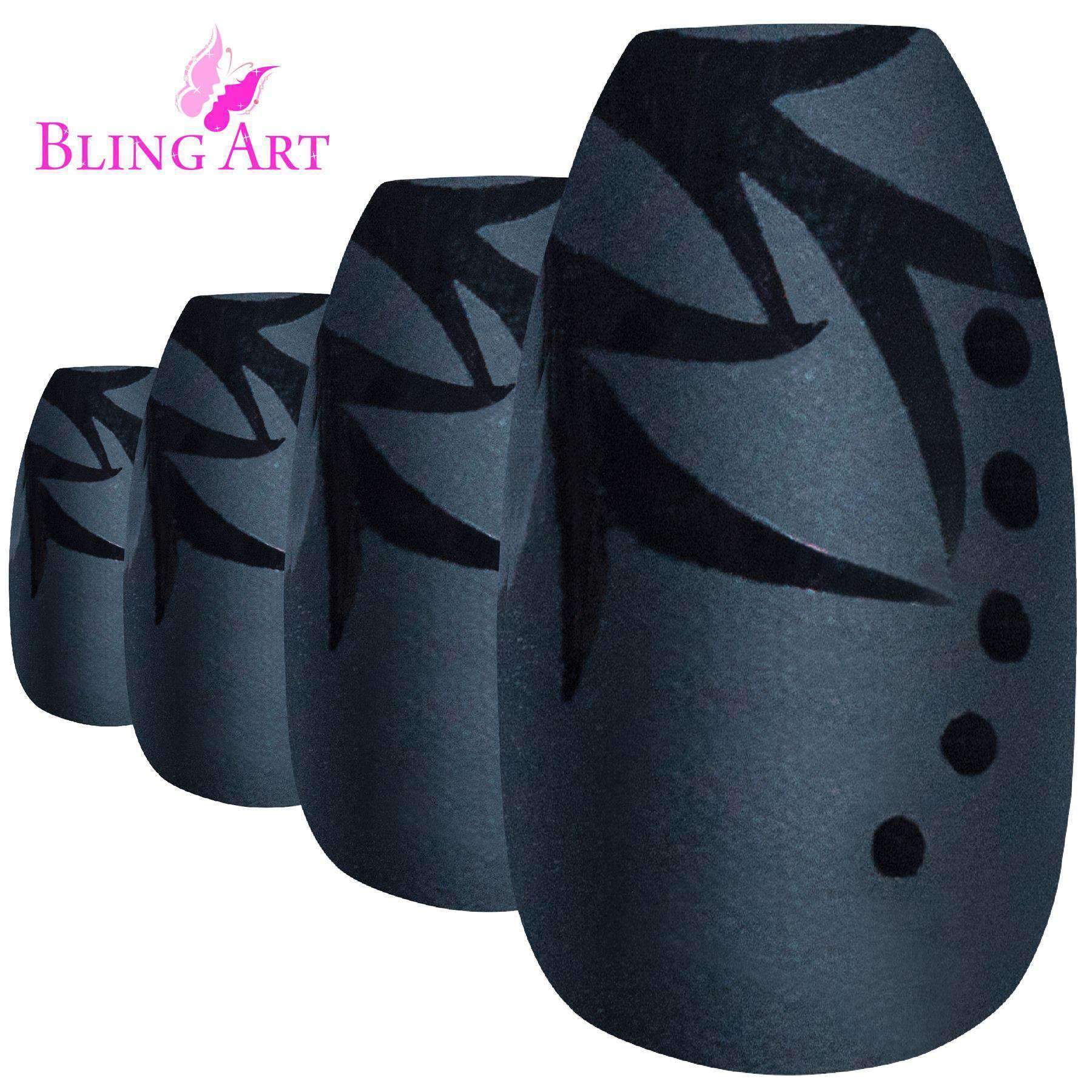 A set of Bling Art Black Leaf Matte Ballerina Coffin Acrylic nails, featuring a chic black leaf design, along with glue, a nail file, and a cuticle stick.