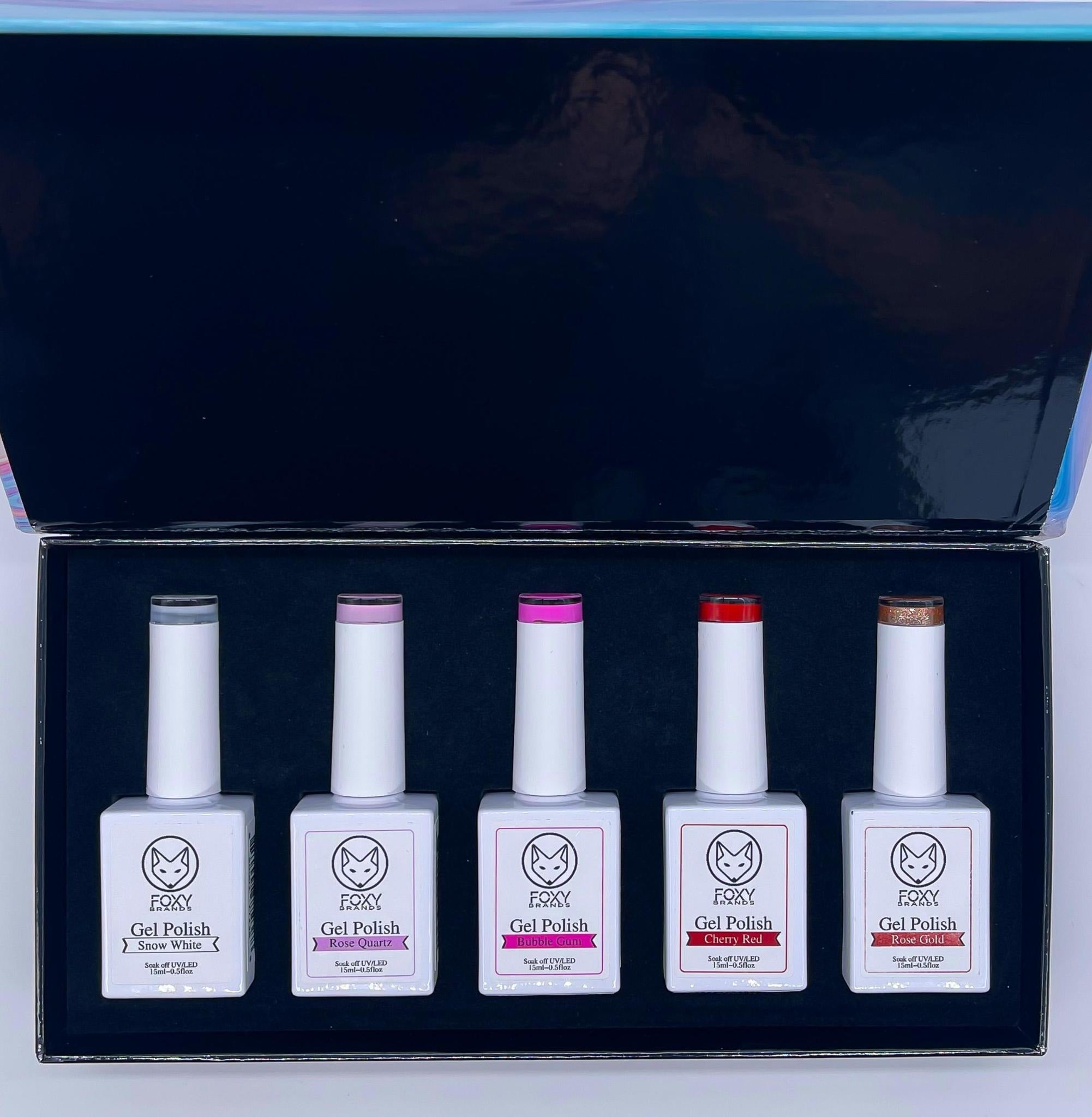 Gel Color Set featuring five vibrant shades: Snow White, Rose Quartz, Bubble Gum, Cherry Red, and Rose Gold in elegant packaging.