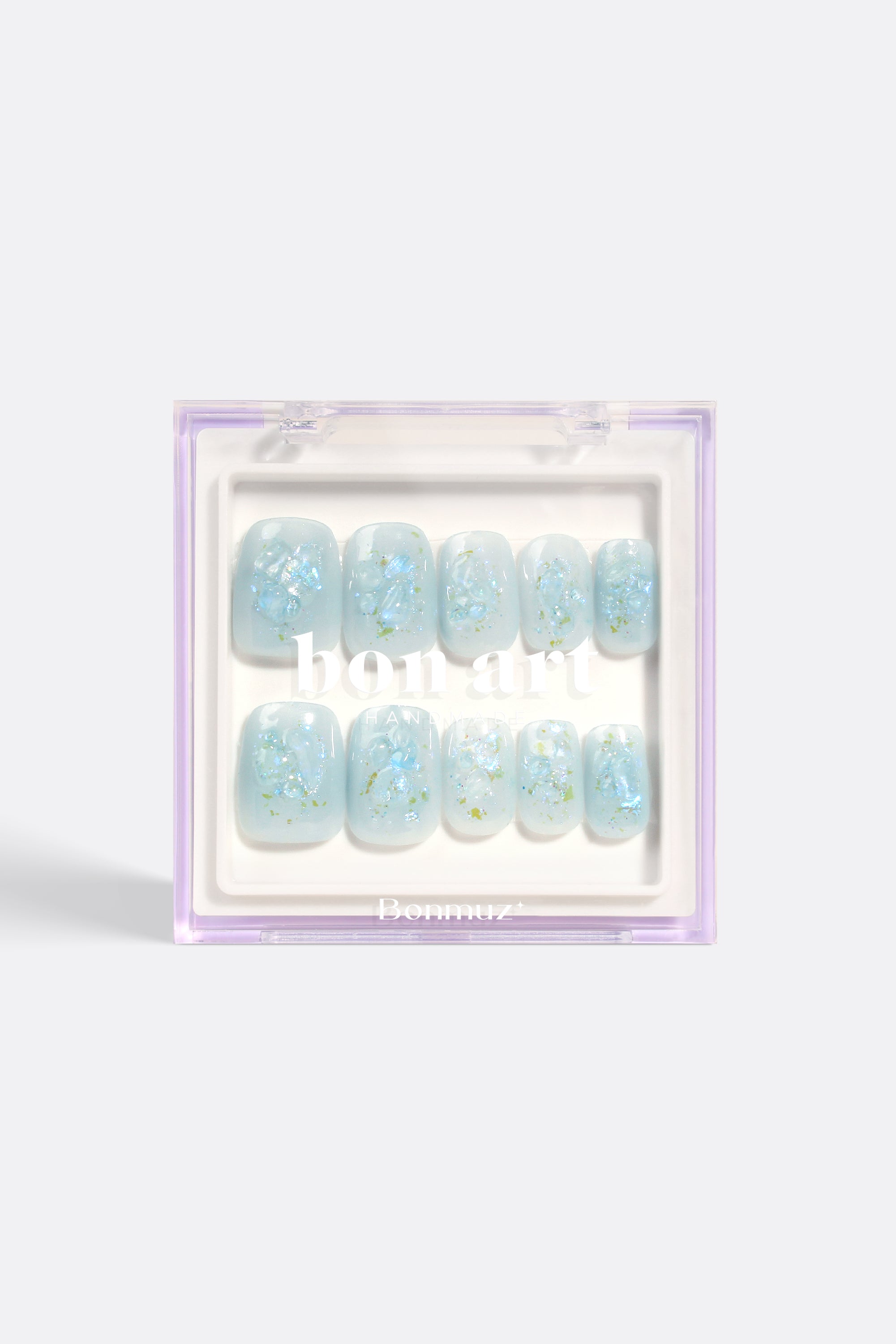 Glacial Gleam Pro Handmade Gel Nails featuring a cool base with iridescent flakes, showcasing a sophisticated winter design.