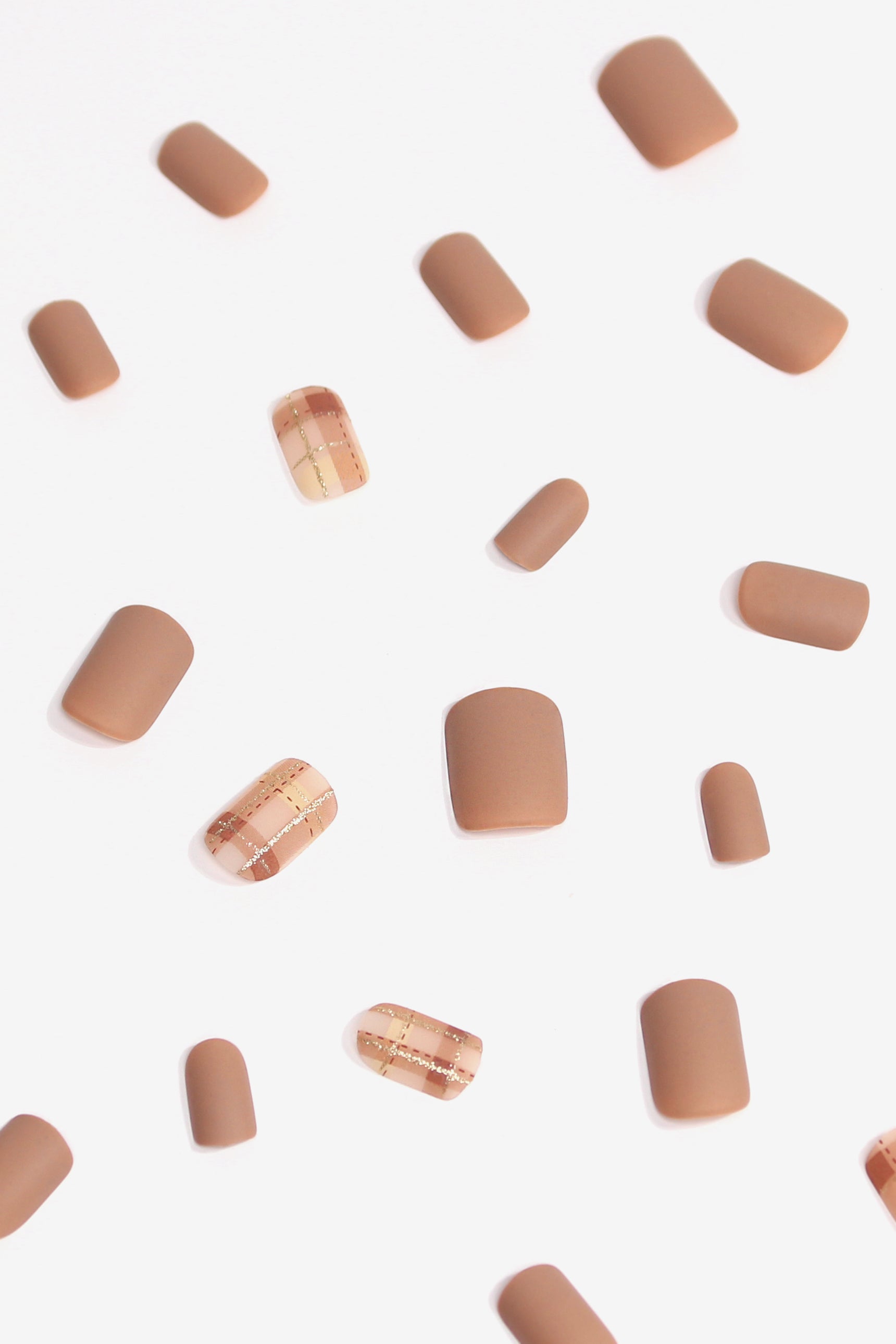 Nude Rose Soft & Durable Press-On Nails featuring a square shape and elegant check pattern in warm colors.