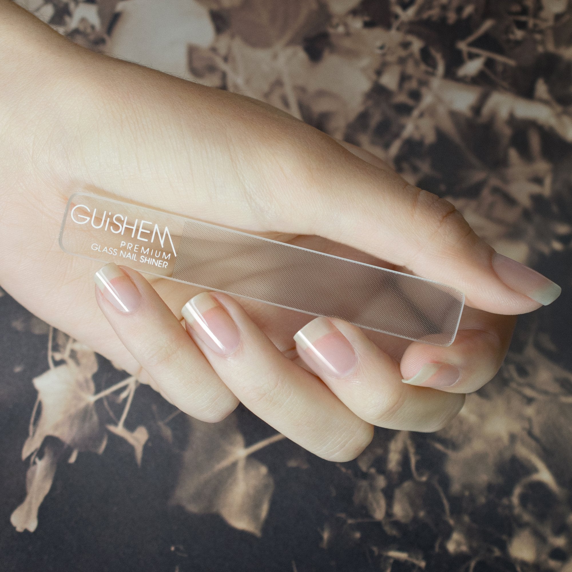 Premium Glass Nail Shiner with case, showcasing its sleek design and glossy finish, perfect for achieving polished nails.