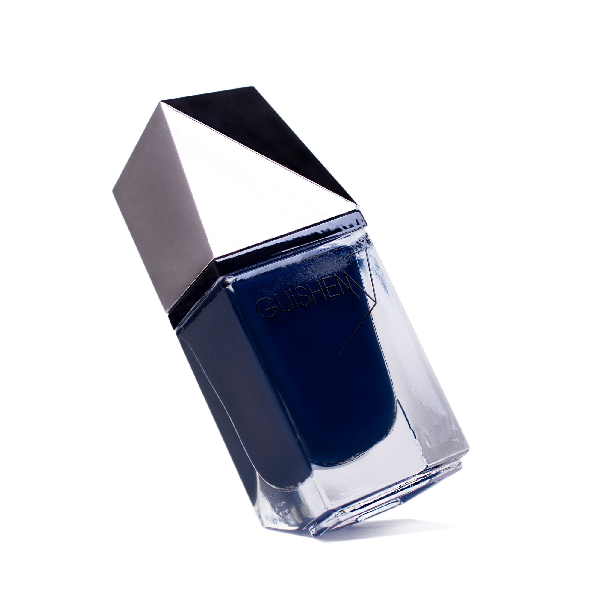 GUiSHEM Premium Nail Lacquer in navy blue crème, showcasing a sleek glass bottle and custom brush design.