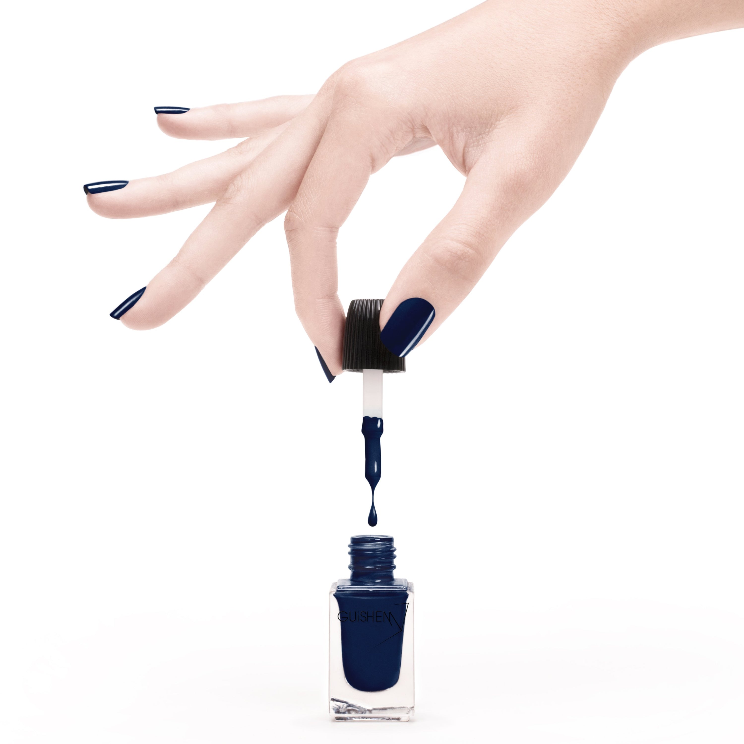 GUiSHEM Premium Nail Lacquer in navy blue crème, showcasing a sleek glass bottle and custom brush design.