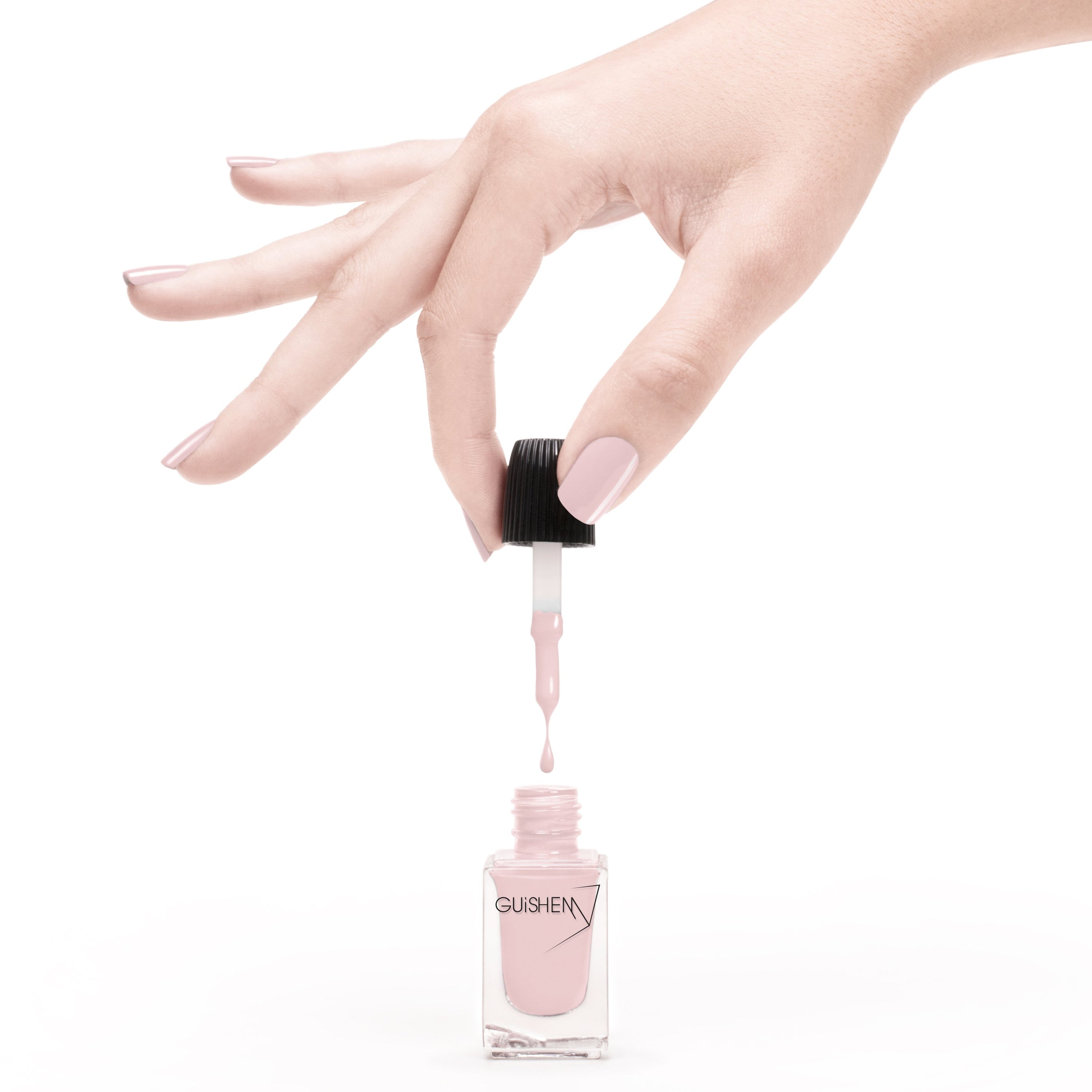 Premium Nail Lacquer in Blush - 032, a nude pink crème nail polish in a 10ml bottle, showcasing its elegant color and glossy finish.