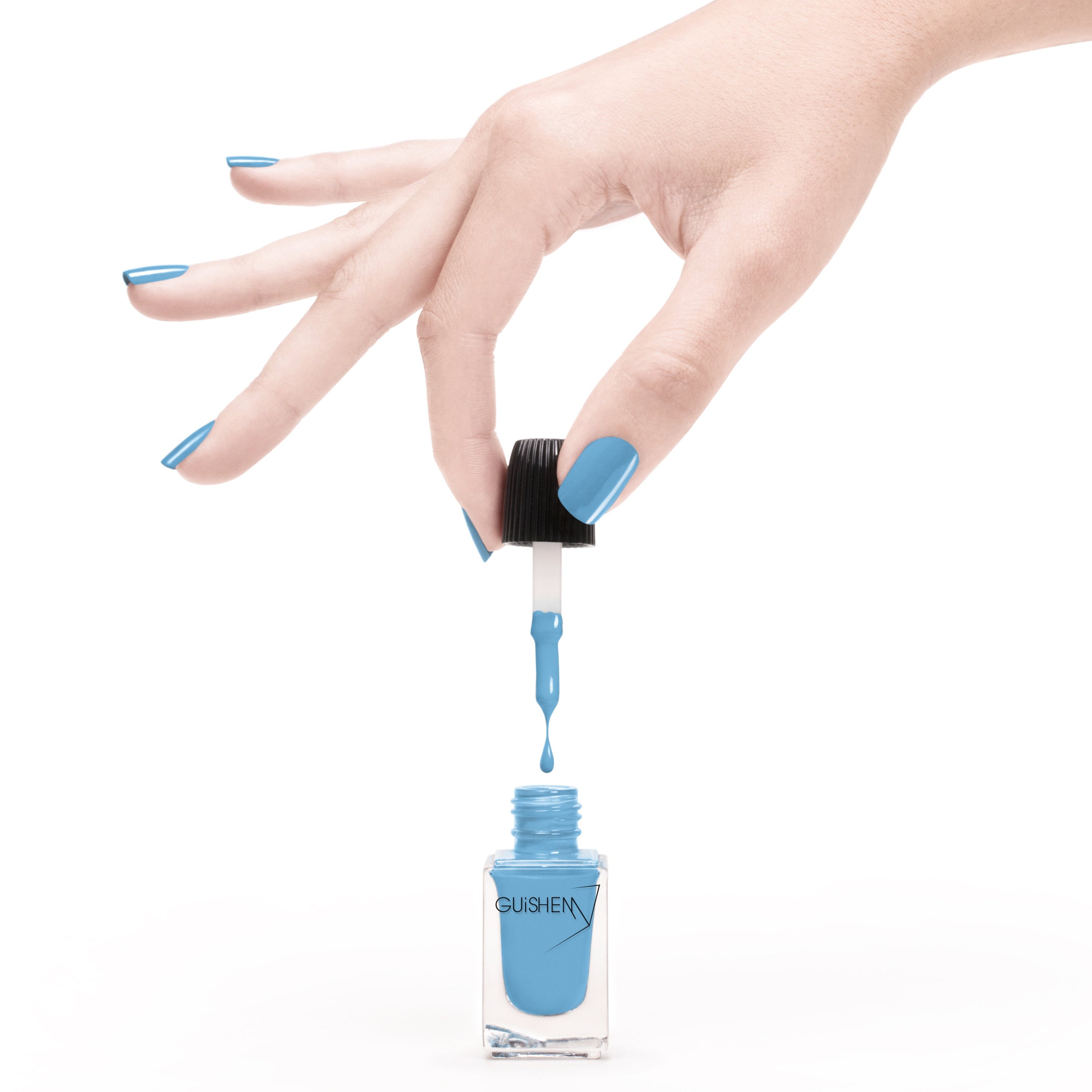 GUiSHEM Premium Nail Lacquer in CAPRI - 120, a sky blue crème nail polish in a stylish glass bottle with a custom brush.