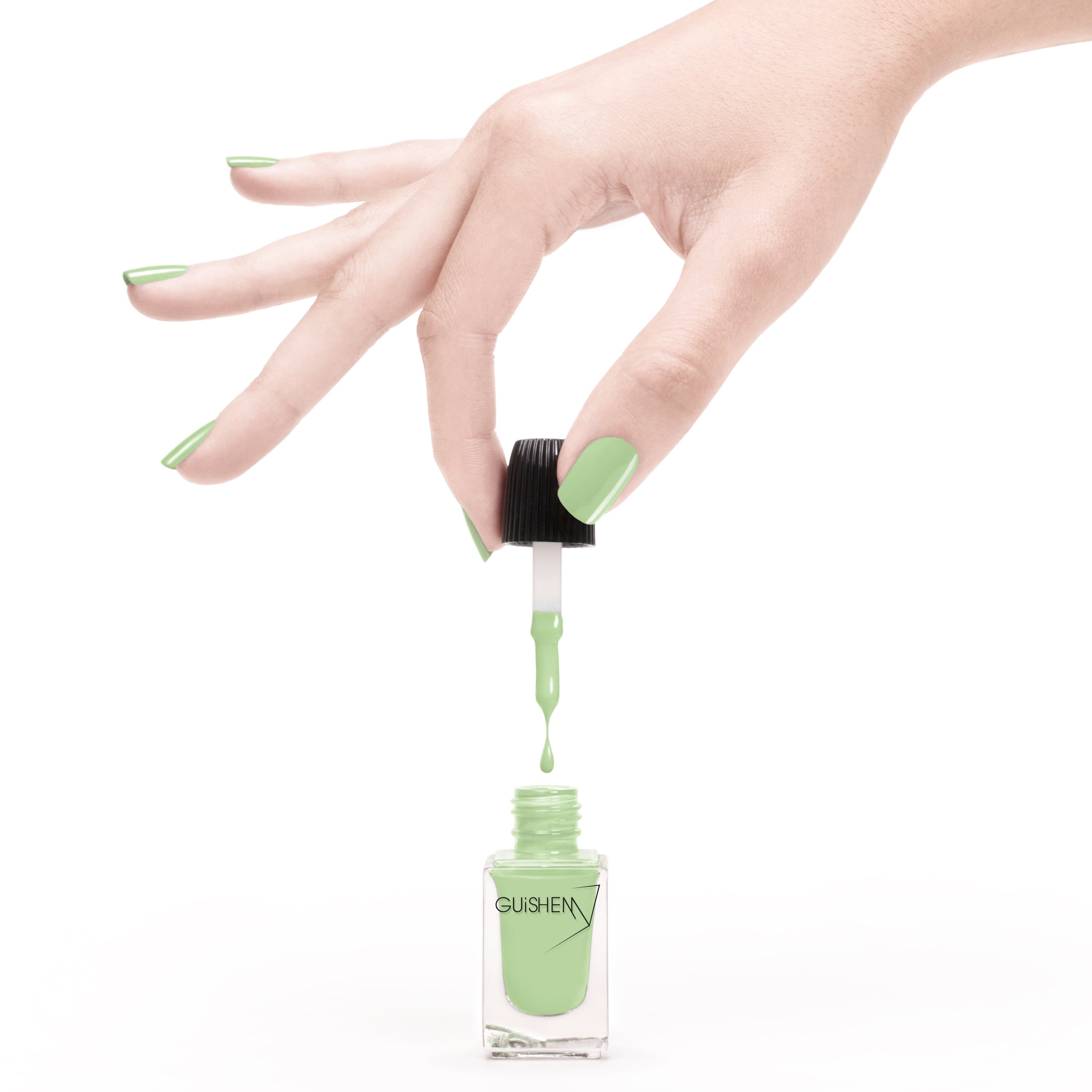 Bottle of GUiSHEM Premium Nail Lacquer in light lime green crème shade, showcasing its modern design and custom brush.