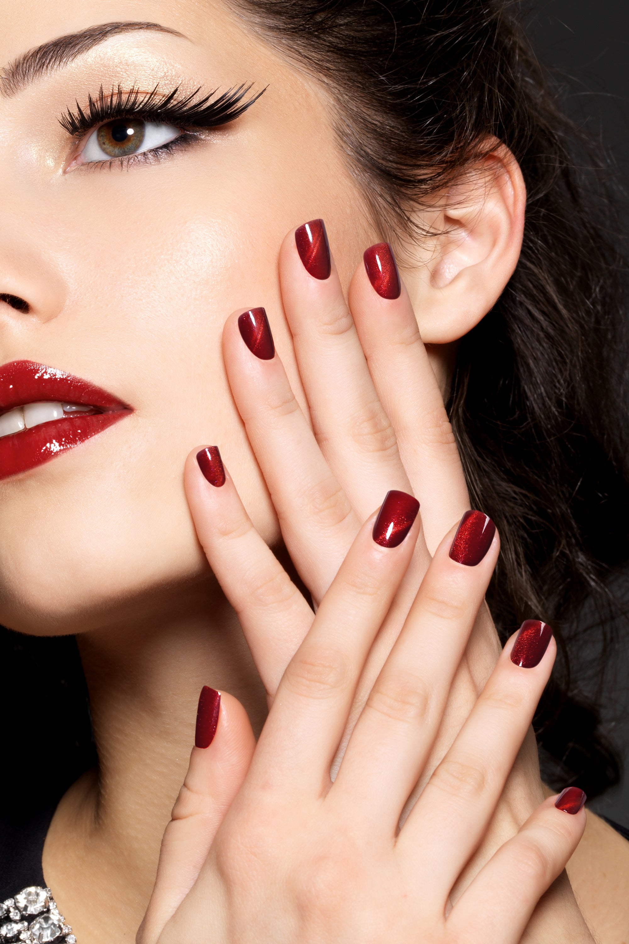 Starlite Red Press-On Nails featuring a glittery deep red design, perfect for glamorous manicures.