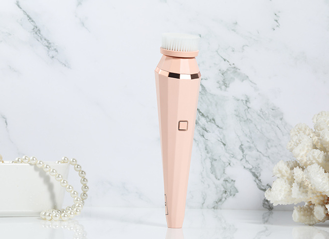 4 In 1 USB Rechargeable Electric Facial Cleansing Brush with four brush heads and charging cable, available in green, pink, and white.