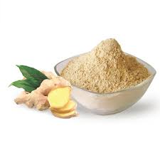 A bowl of organic African Ginger Root Powder with fresh ginger roots in the background, showcasing its rich color and texture.