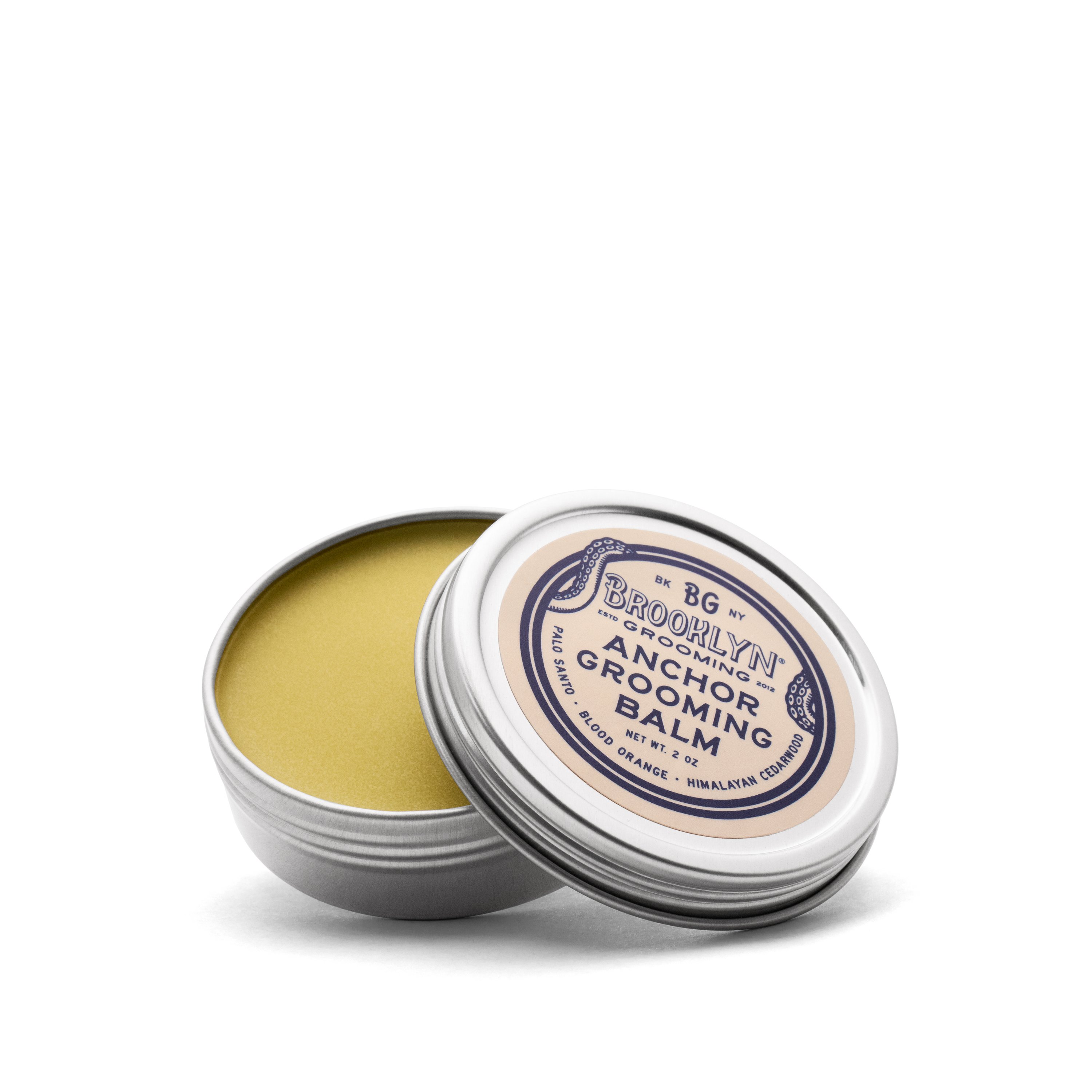 Anchor Grooming Balm in a seamless aluminum tin, showcasing its natural ingredients and unique scent profile.