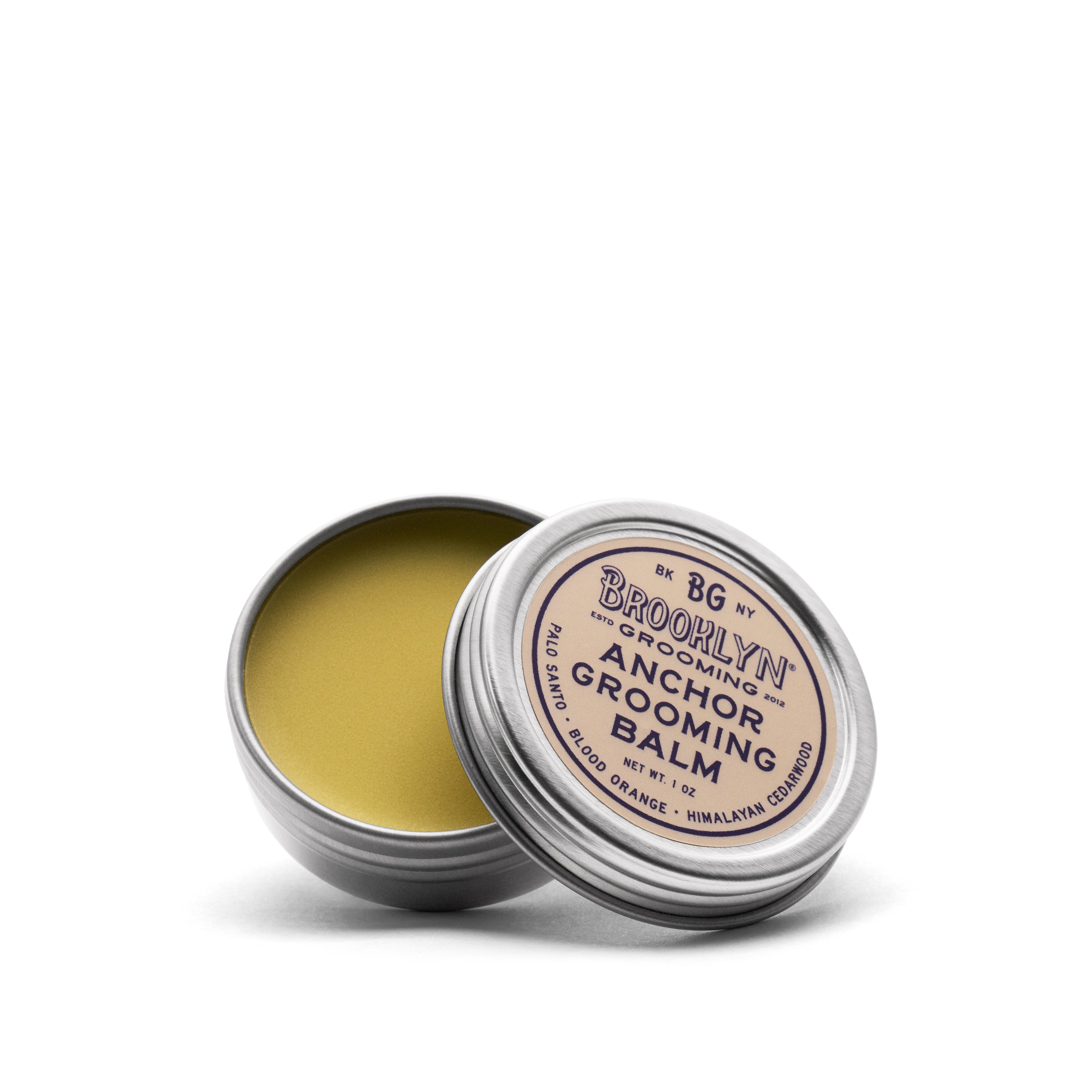 Anchor Grooming Balm in a seamless aluminum tin, showcasing its natural ingredients and unique scent profile.