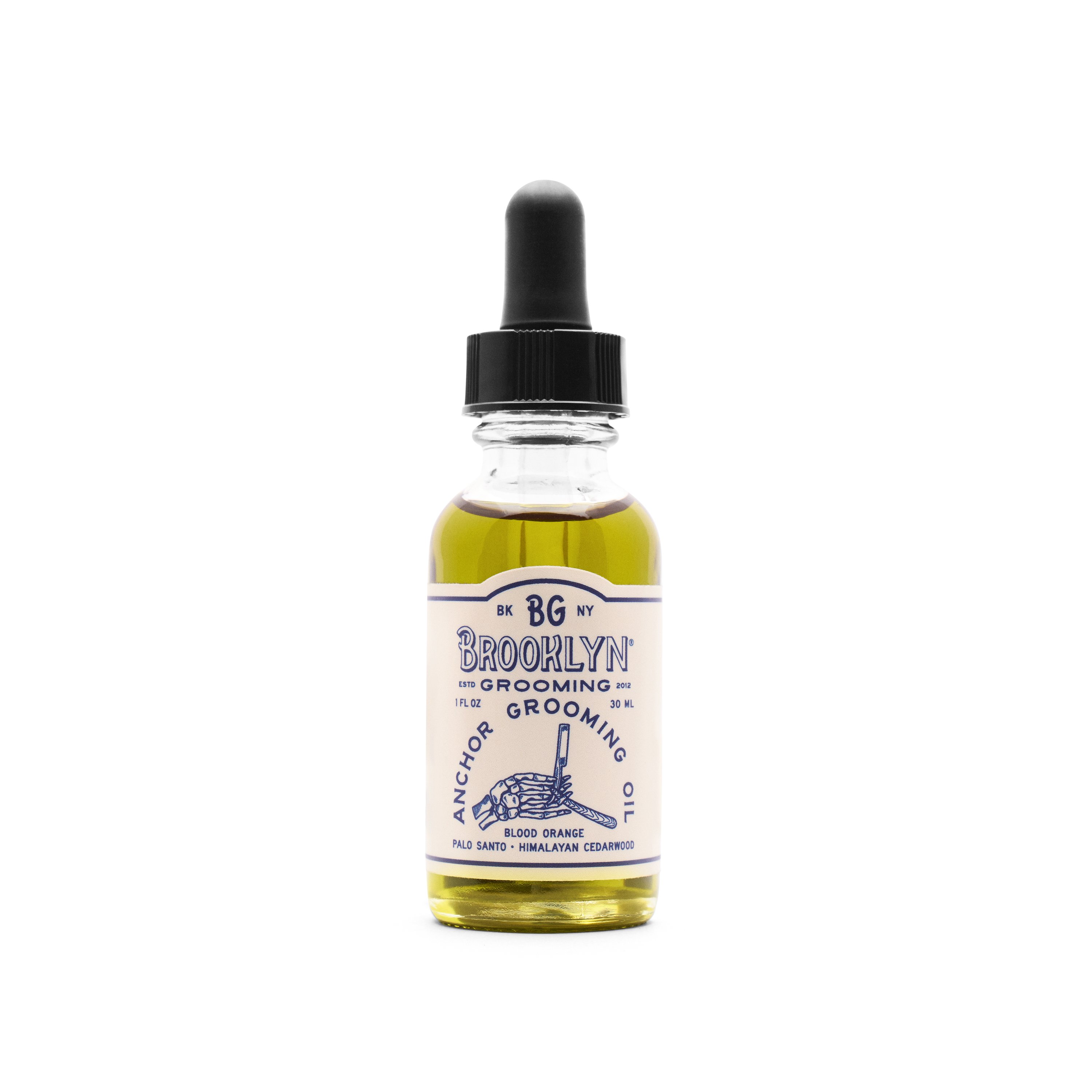 Bottle of Anchor Grooming Oil with a dropper, showcasing its light golden color and elegant design, set against a neutral background.