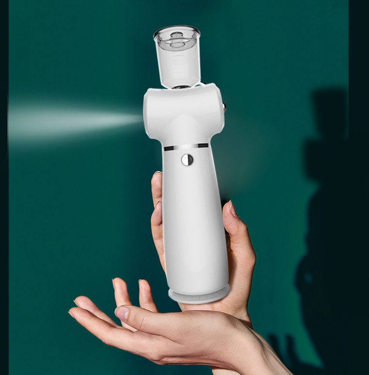 Automatic Spray Oxygen Injector with a sleek design, showcasing its water tank and charging port.