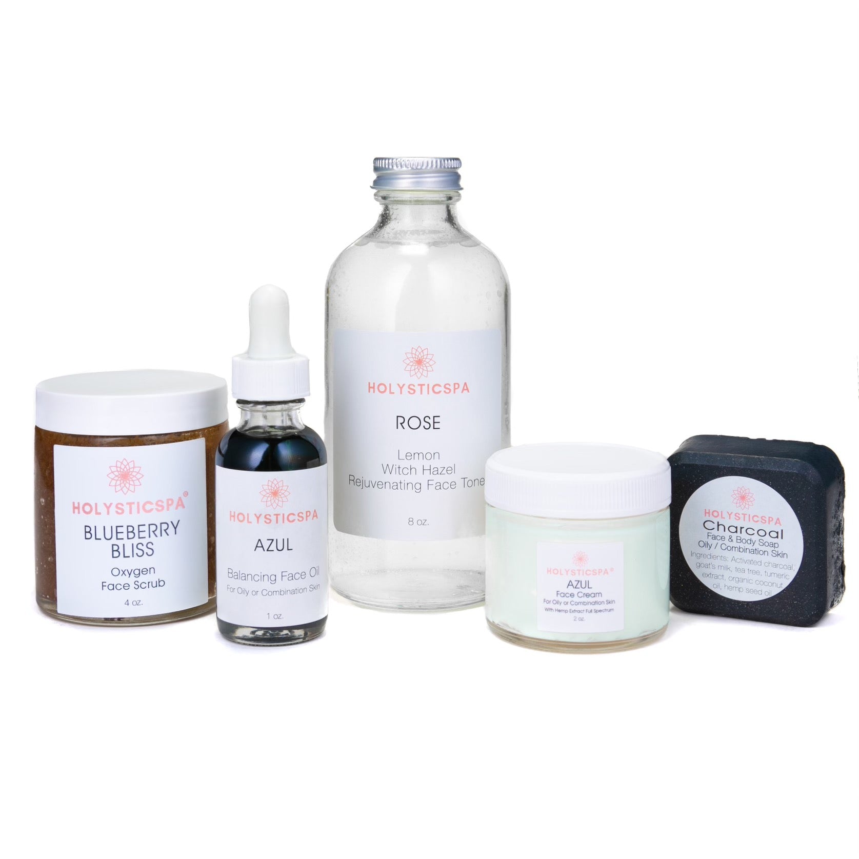 Balancing Skincare Bundle featuring Blueberry Bliss Face Scrub, Azul Face Oil, Rose Rejuvenating Face Toner, Charcoal Soap, and Azul Face Cream.