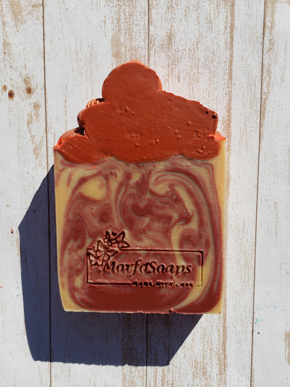 A bar of Morfosoaps Bay Leaf and Tobacco Soap showcasing its unique texture and earthy colors, perfect for a luxurious bathing experience.