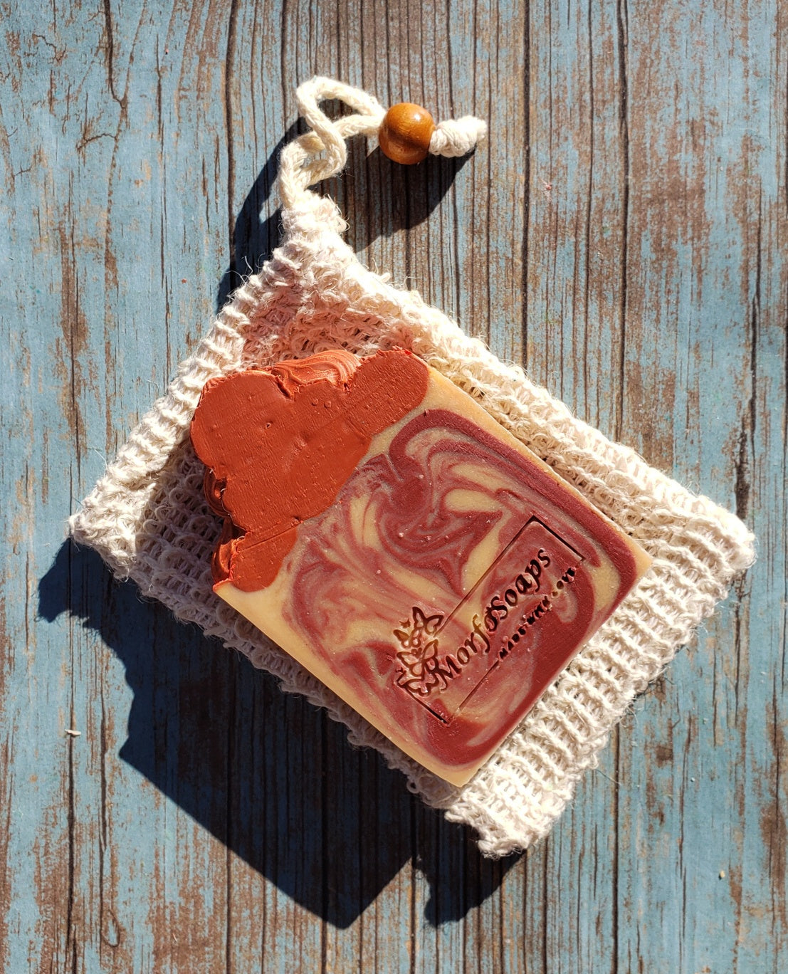 A bar of Morfosoaps Bay Leaf and Tobacco Soap showcasing its unique texture and earthy colors, perfect for a luxurious bathing experience.