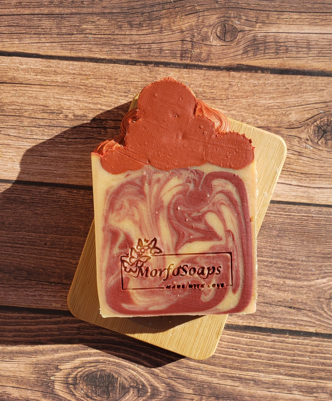 A bar of Morfosoaps Bay Leaf and Tobacco Soap showcasing its unique texture and earthy colors, perfect for a luxurious bathing experience.