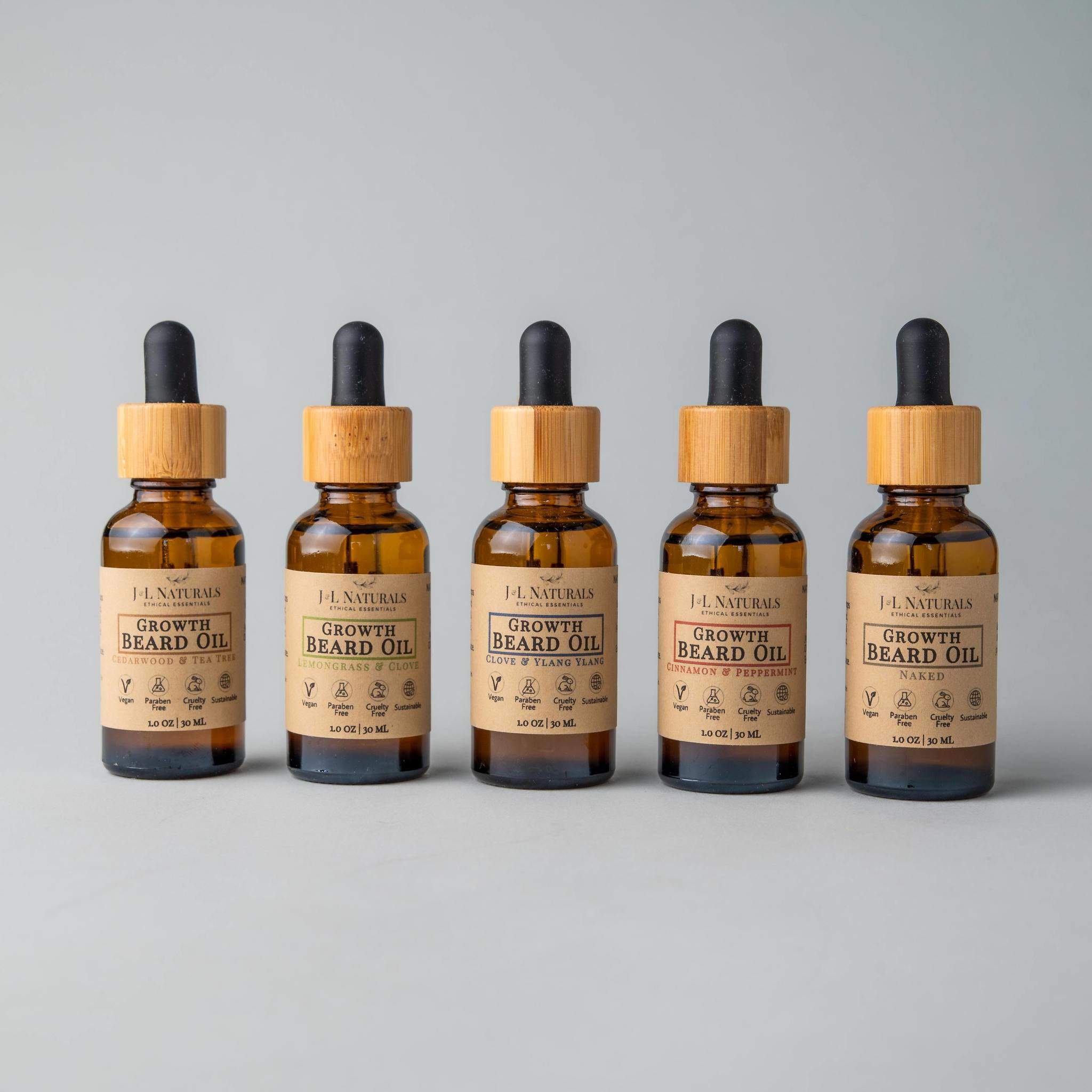 Beard Oil Bundle featuring five bottles of premium grooming oils in various scents, designed for beard care and growth.