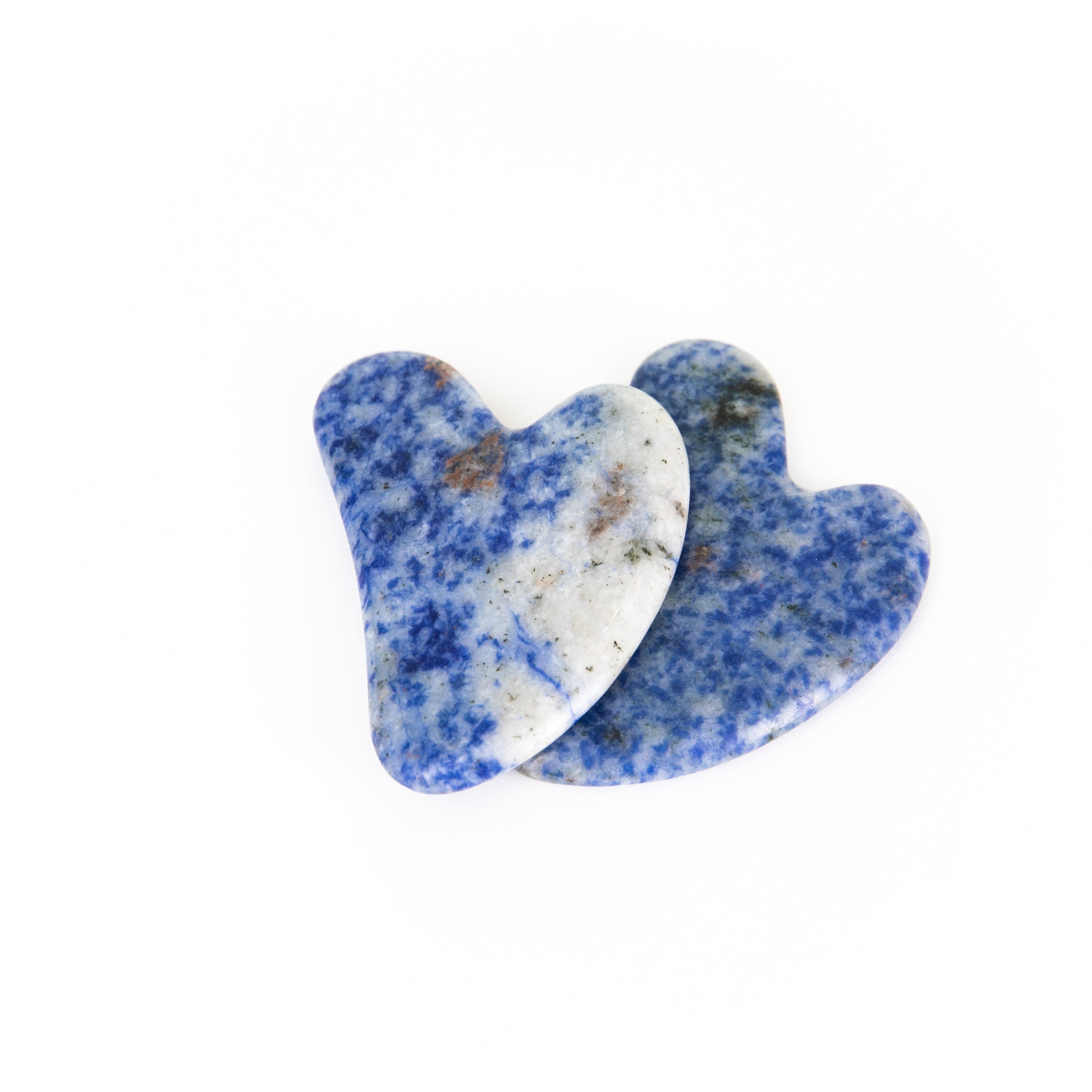 A Blue Sodalite Gua Sha tool, showcasing its smooth, polished surface and unique blue patterns, perfect for facial massage.