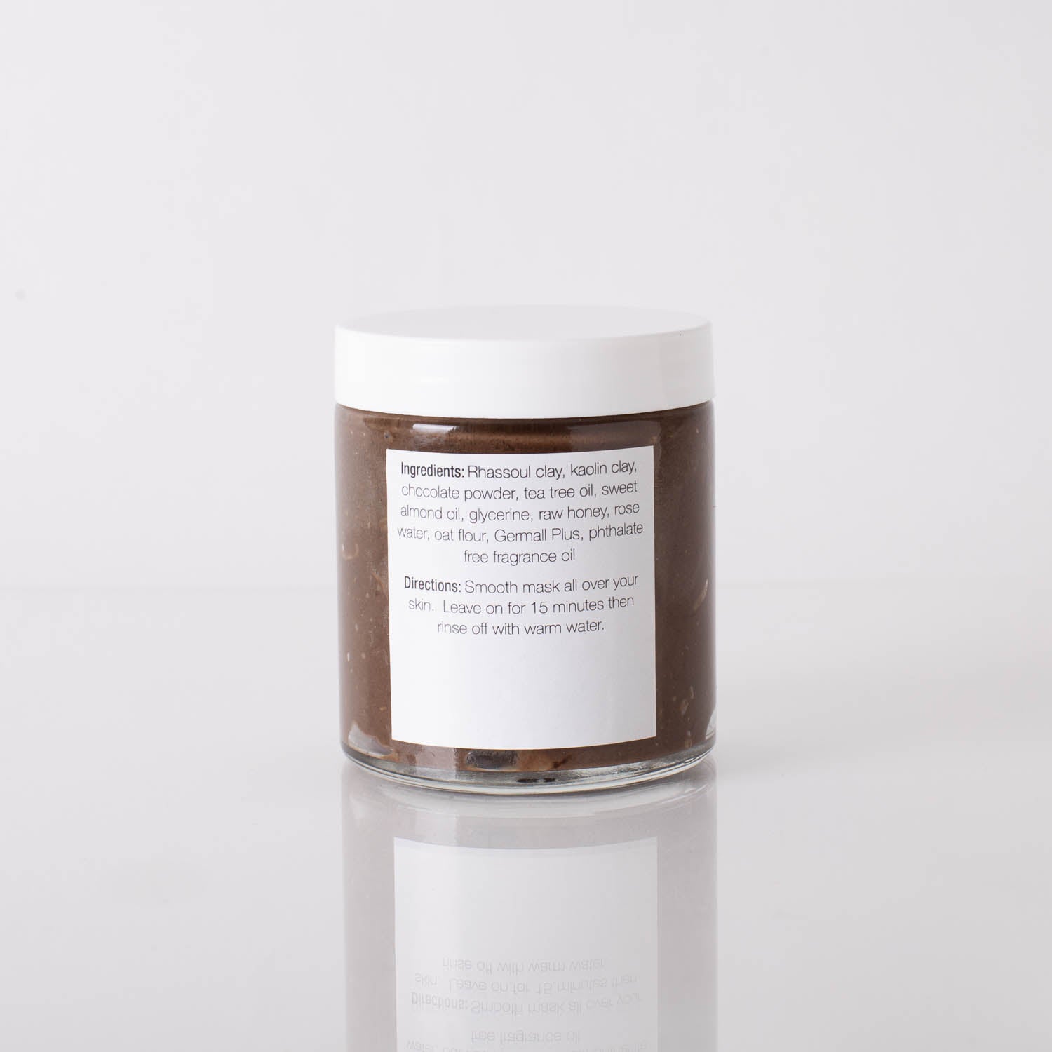 Brownie Balancing Face Mask in a jar, showcasing its rich, chocolatey texture and natural ingredients.