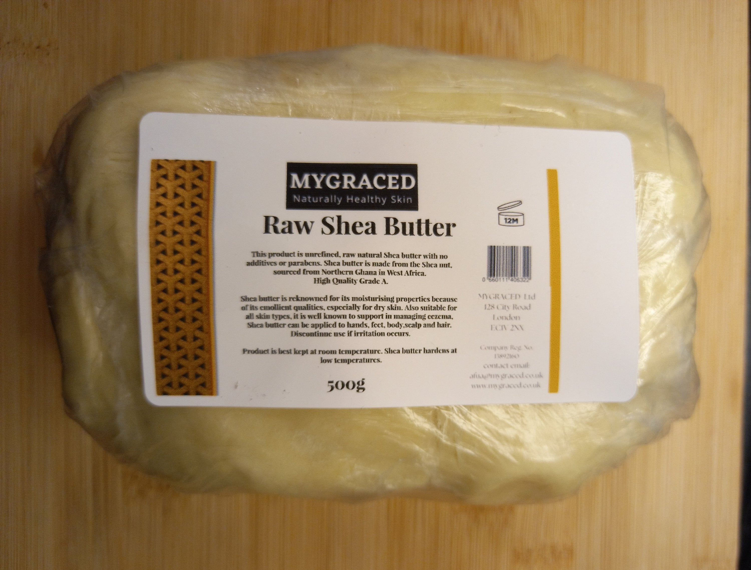 Packaged raw shea butter block.