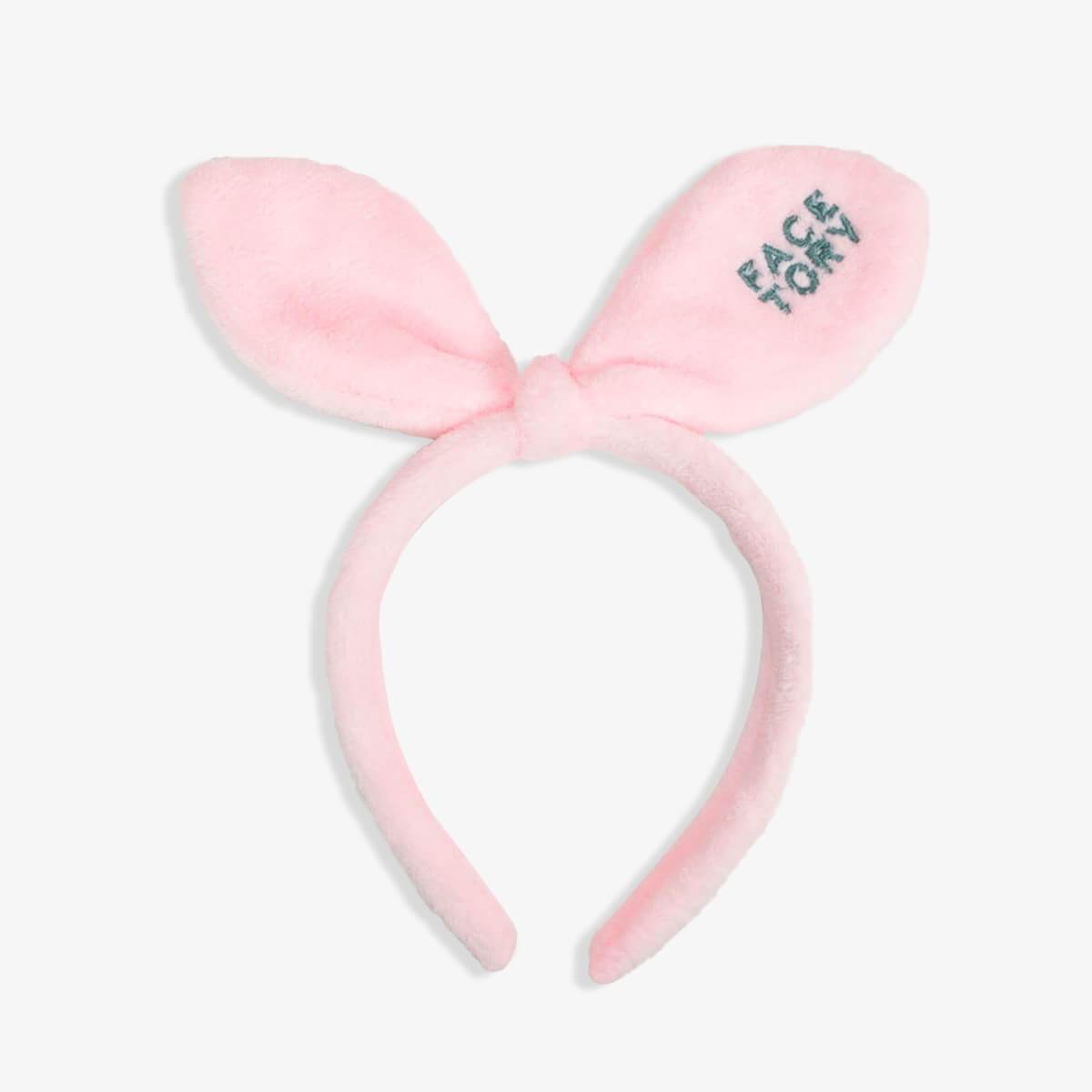 Blushing Pink Bunny Bow Hairband, perfect for skincare routines, featuring a cute bunny bow design.