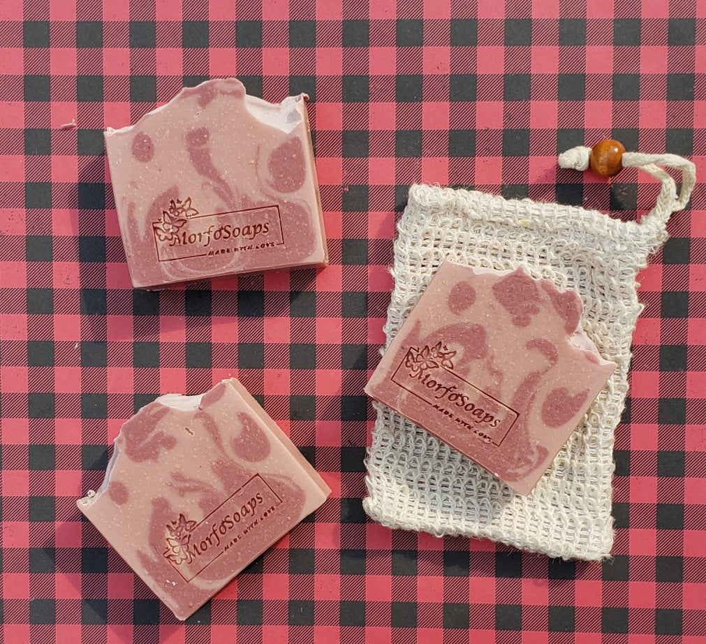 Handmade Calamine Soap bar with lavender and peppermint scent, featuring a unique artisanal design.