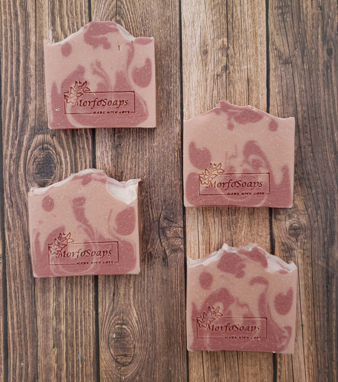 Handmade Calamine Soap bar with lavender and peppermint scent, featuring a unique artisanal design.