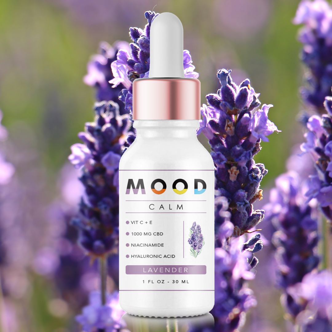 A bottle of CALM Face Serum featuring a sleek design, with a dropper cap, surrounded by lavender flowers and a calming background.