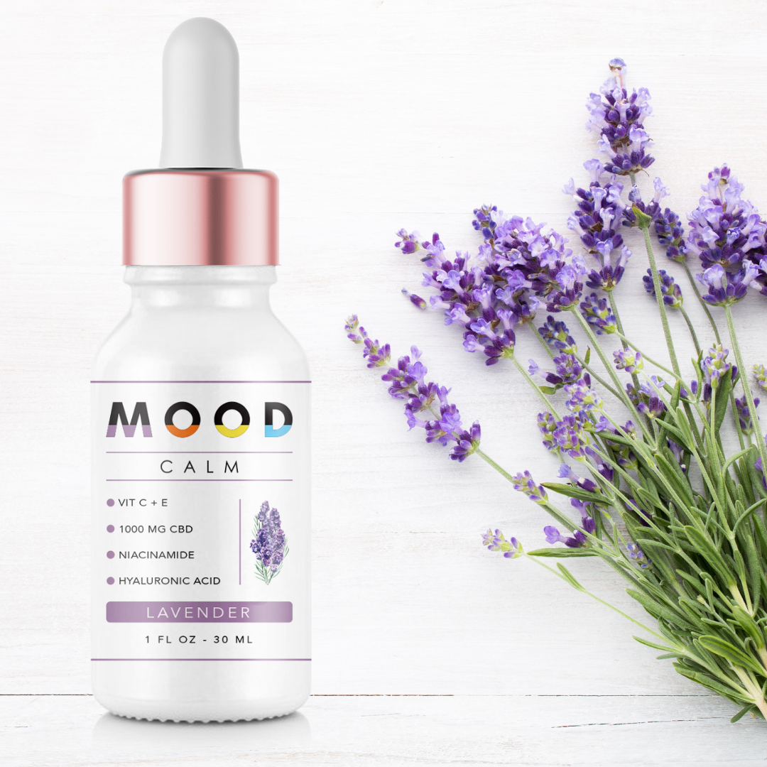 A bottle of CALM Face Serum featuring a sleek design, with a dropper cap, surrounded by lavender flowers and a calming background.