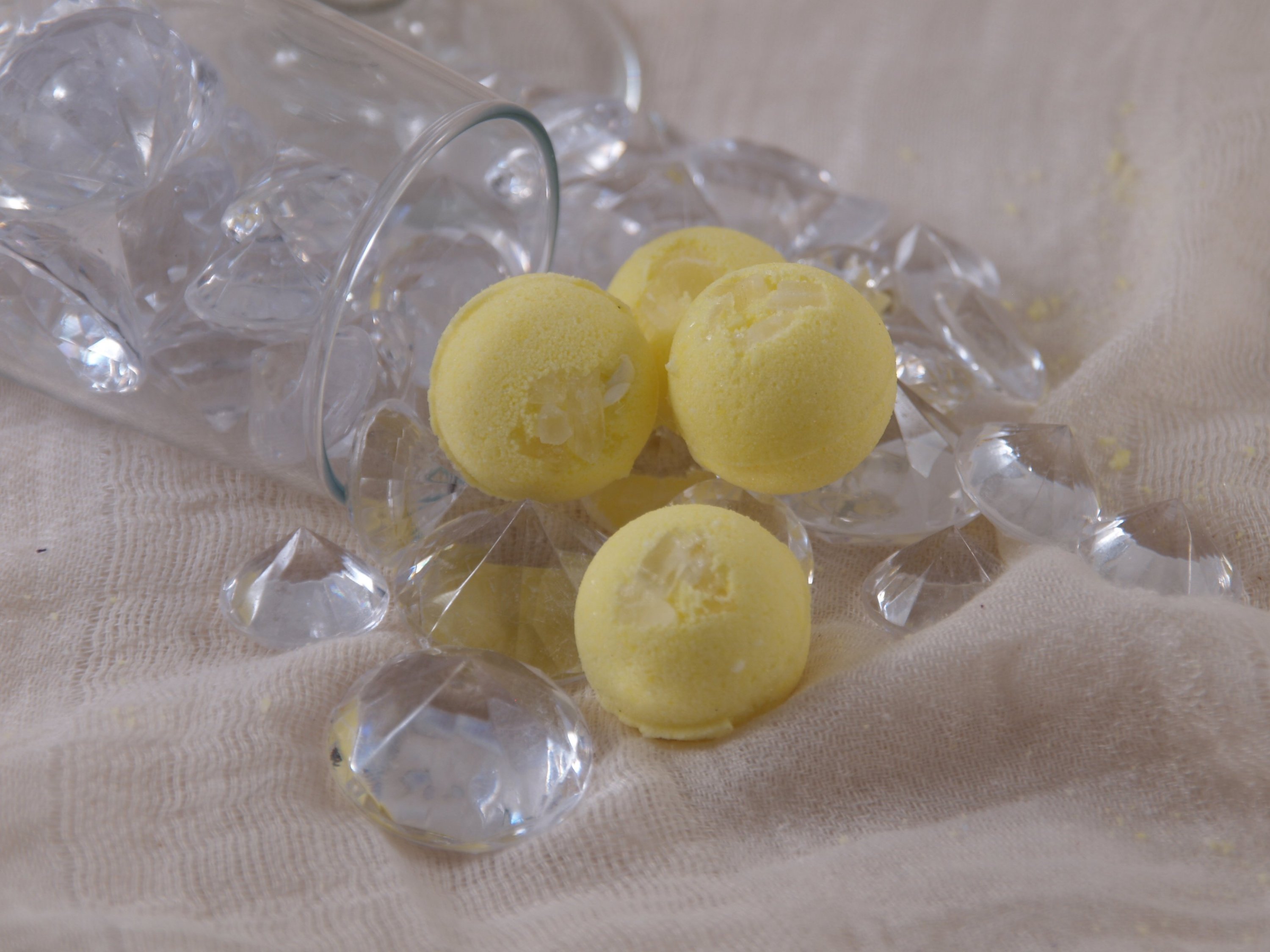 Champagne Ice Bath Bomb in vibrant colors, showcasing its effervescent fizz and luxurious design.