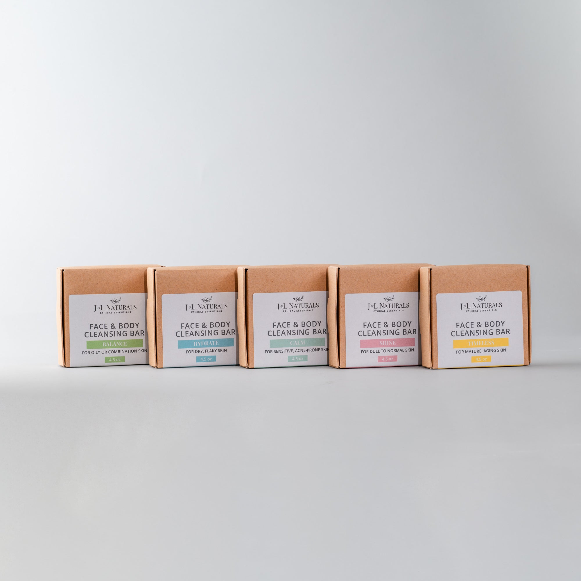 Cleanser Bundle featuring five natural cleansing bars in eco-friendly packaging, designed for various skin types.