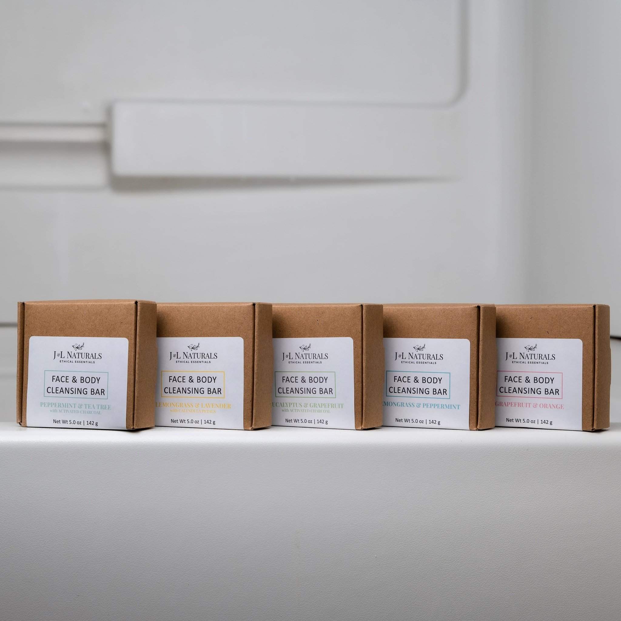 A natural Cleansing Bar displayed on a wooden surface, showcasing its smooth texture and eco-friendly packaging.