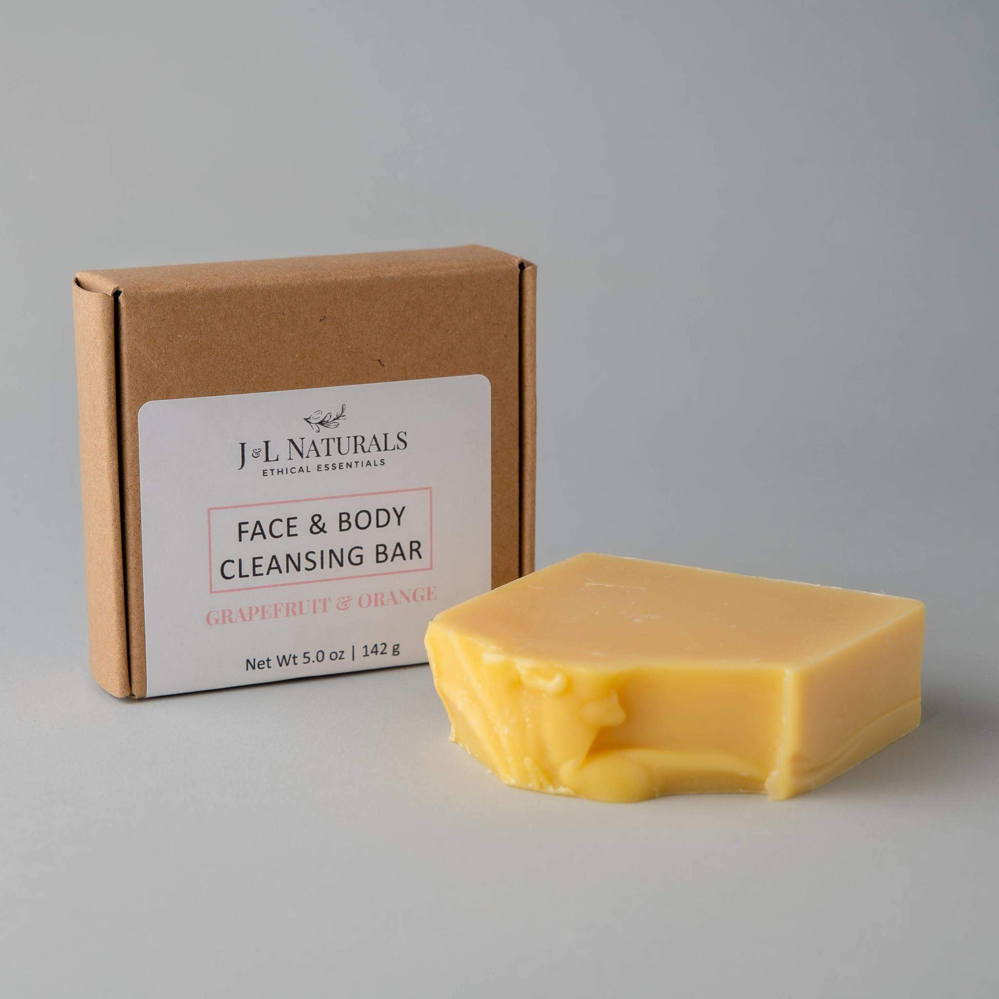 A natural Cleansing Bar displayed on a wooden surface, showcasing its smooth texture and eco-friendly packaging.