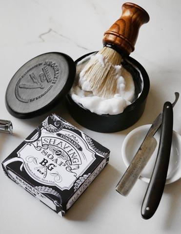 Commando Shaving Soap in a round shape, showcasing its creamy texture and organic ingredients, perfect for a luxurious shaving experience.