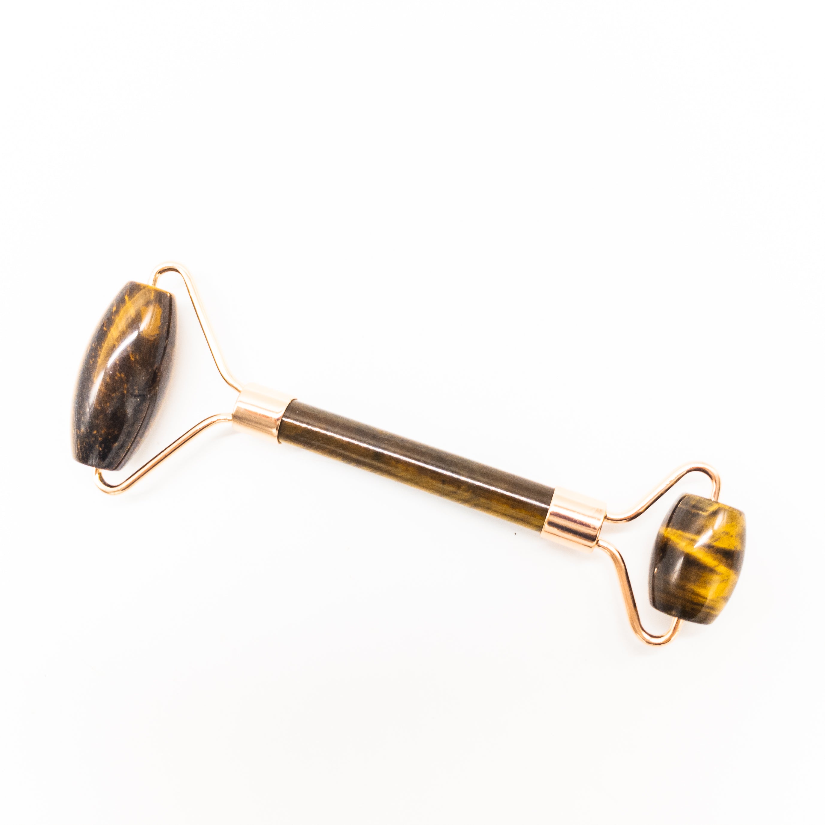 Copper & Crystal Face Roller featuring natural polished crystals, designed for facial massage and skincare.