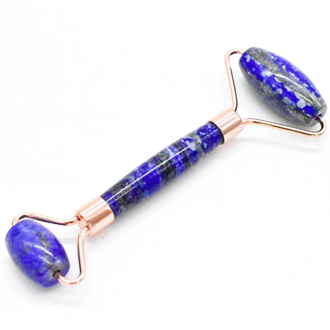 Copper & Crystal Face Roller featuring natural polished crystals, designed for facial massage and skincare.