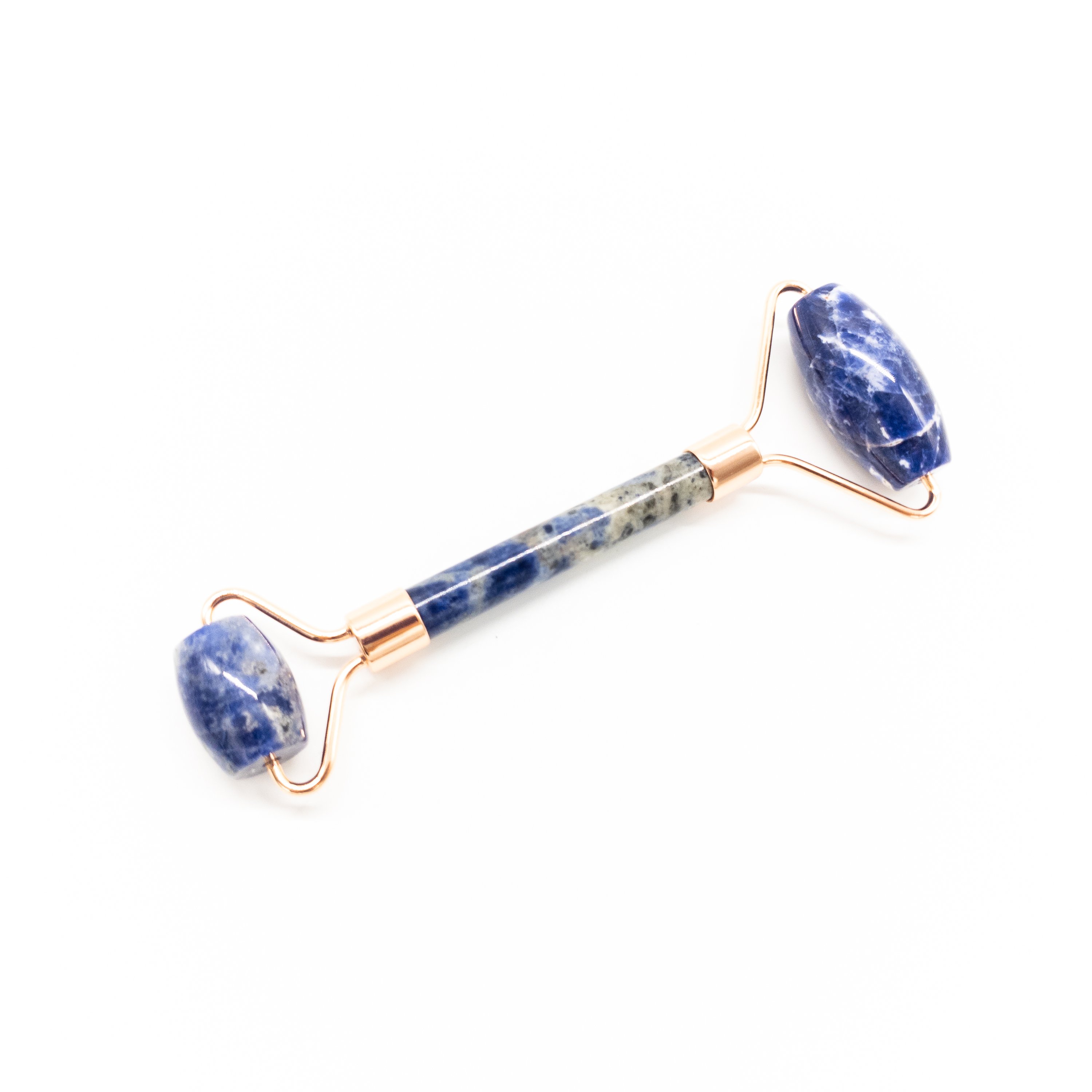 Copper & Crystal Face Roller featuring natural polished crystals, designed for facial massage and skincare.