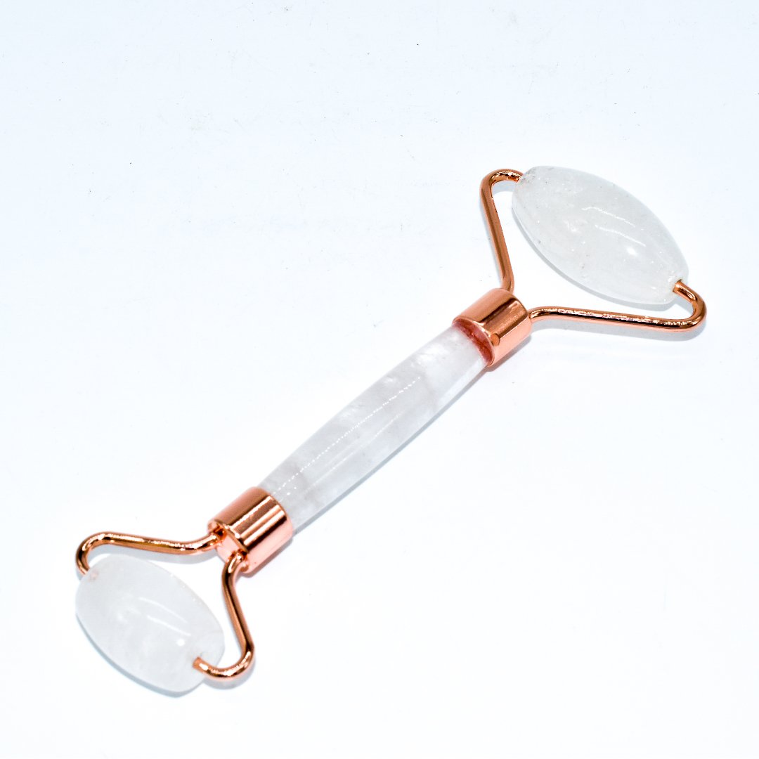 Copper & Crystal Face Roller featuring natural polished crystals, designed for facial massage and skincare.